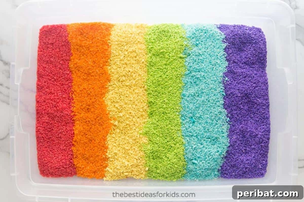 40 Brilliant Rainbow Craft Projects 8 A bowl filled with vibrant, multi-colored rainbow rice for sensory play