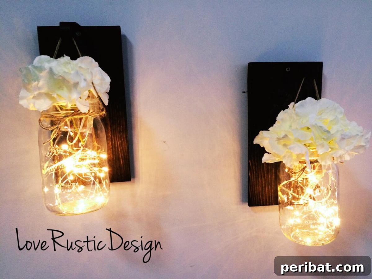 Mason Jar Magic: 20 DIY Tissue Paper Lanterns 18 Set of two rustic lighted mason jar sconces featuring faux hydrangeas and fairy lights.
