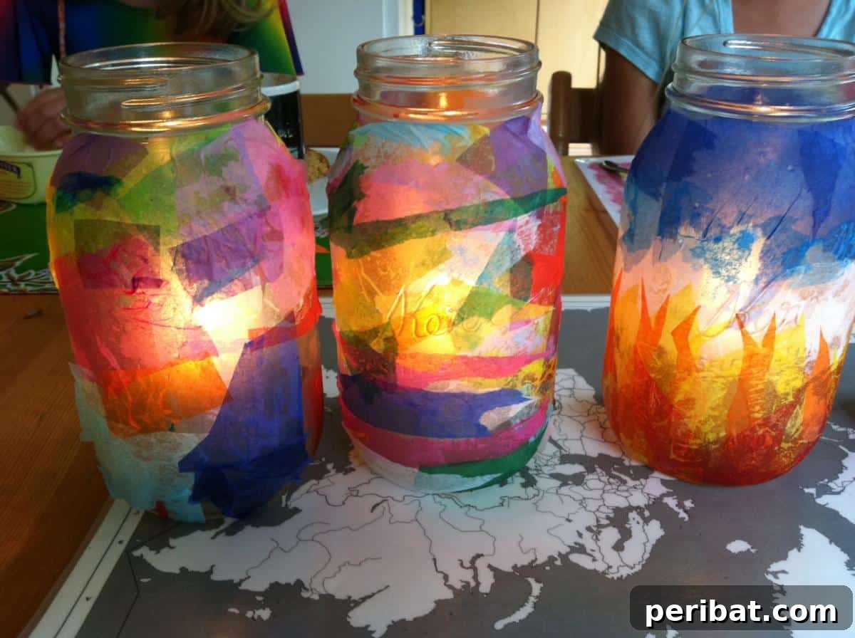 Mason Jar Magic: 20 DIY Tissue Paper Lanterns 6 A tissue paper mason jar lantern designed to mimic a stained-glass effect, casting vibrant colors.