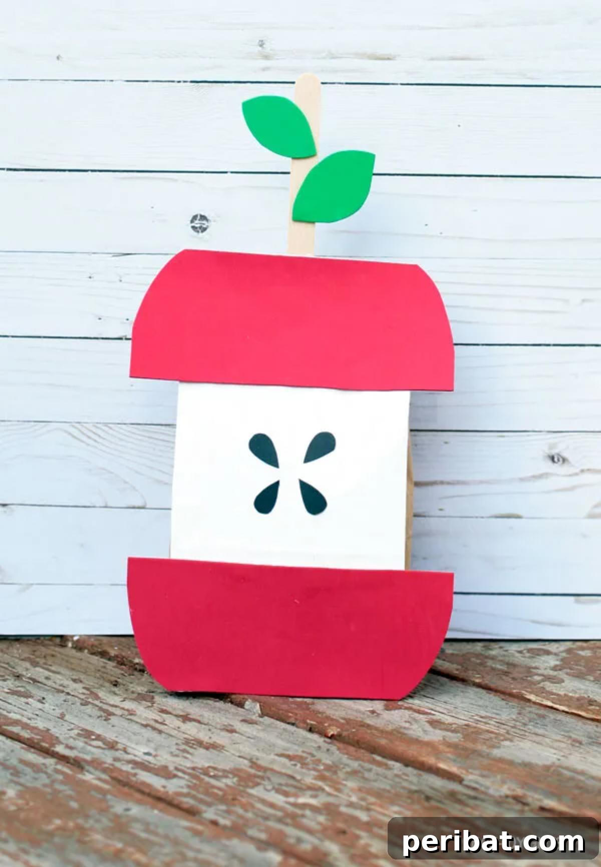 Paper Bag Masterpieces Made Effortless 11 A vibrant stuffed paper bag apple craft, appearing soft and inviting.