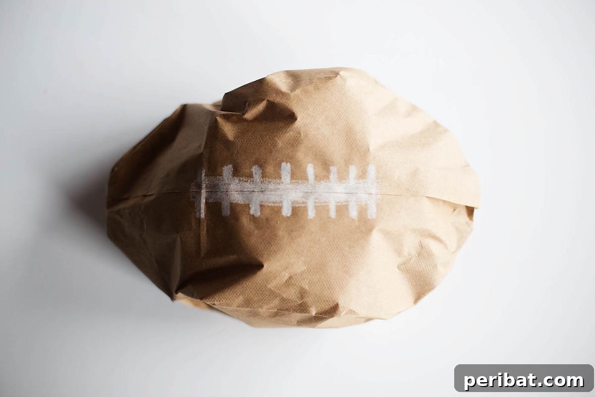 Paper Bag Masterpieces Made Effortless 15 A simple yet effective DIY paper bag football craft, ready for play.