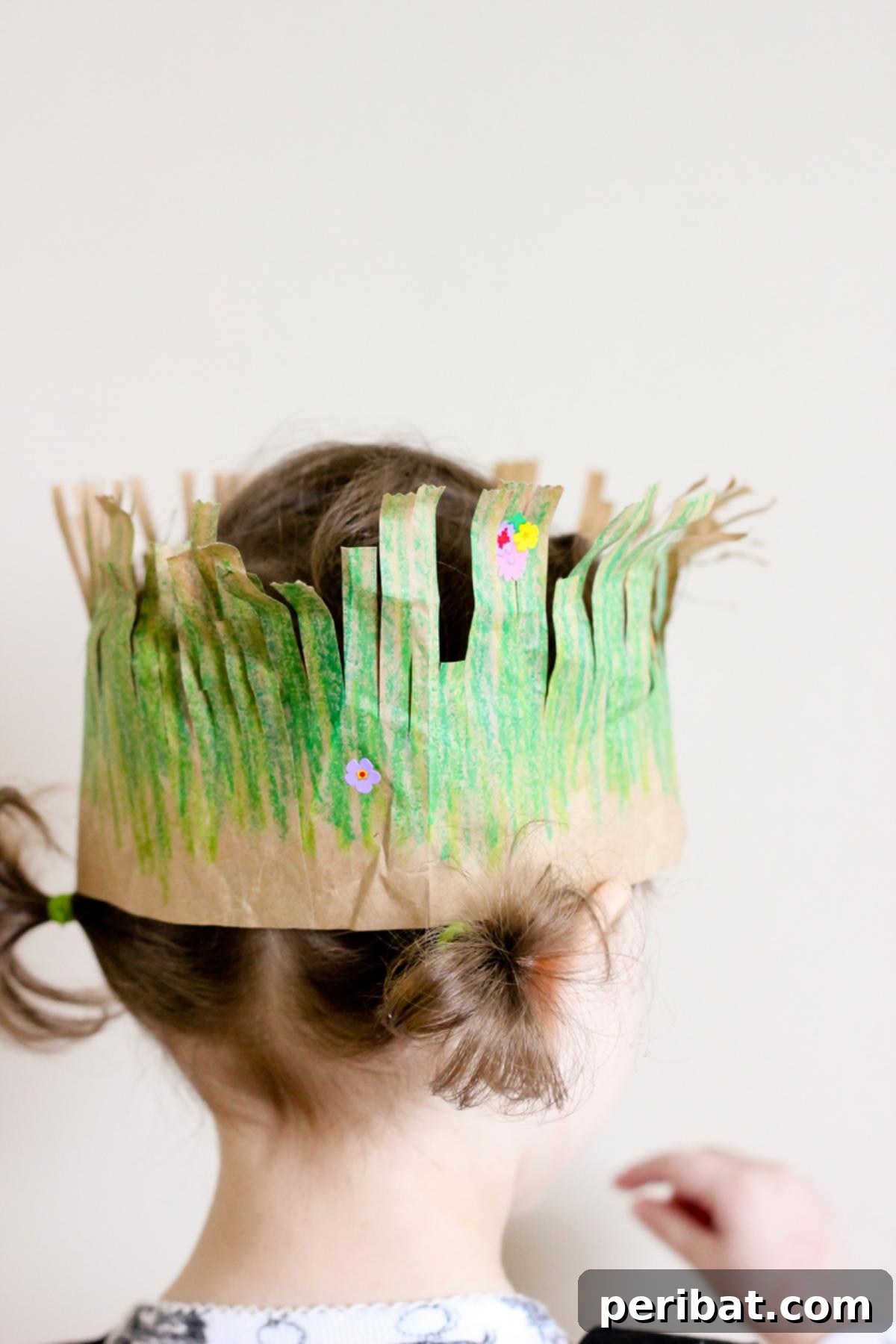 Paper Bag Masterpieces Made Effortless 19 An adorable grass crown crafted from natural elements, perfect for celebrating Earth Day.
