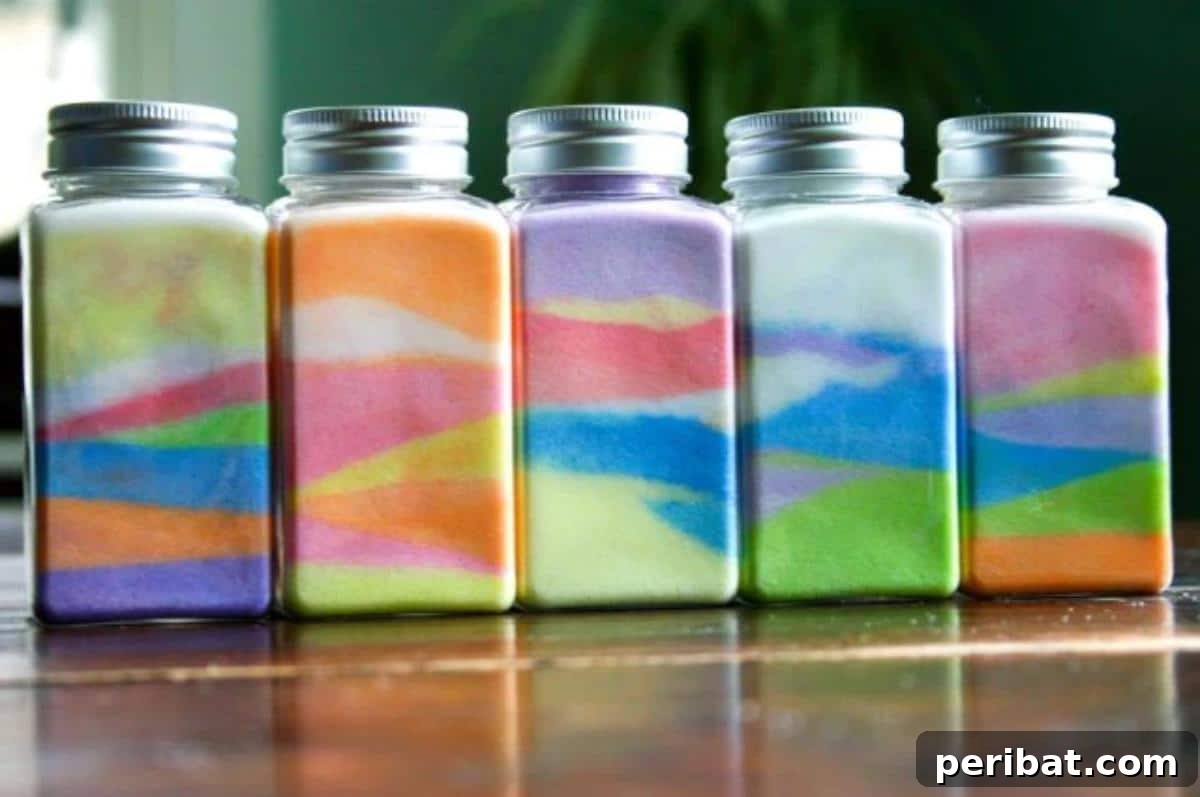 Crafting Colorful Salt Jars 25 Project Ideas 4 A collection of 'Rainbow in a Jar' crafts, featuring clear glass jars filled with pastel layered salt, evoking a sense of calm and beauty. Perfect for Easter centerpieces or children's room decor.