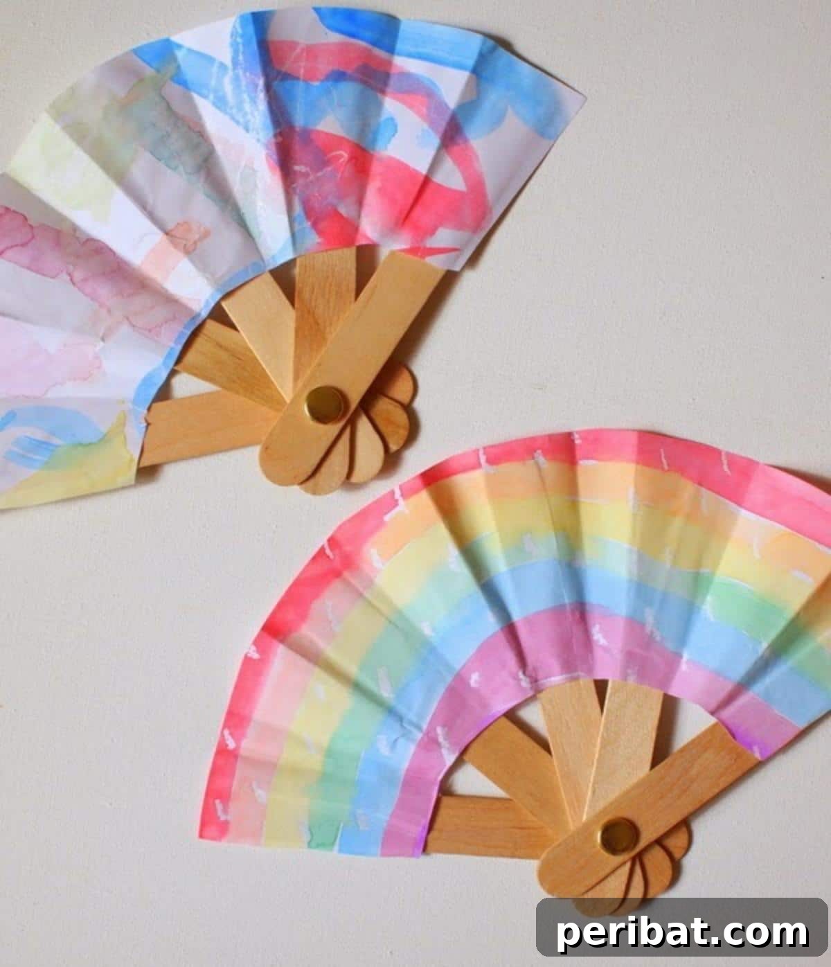 Folding Popsicle Stick Fans for a functional and decorative accessory.