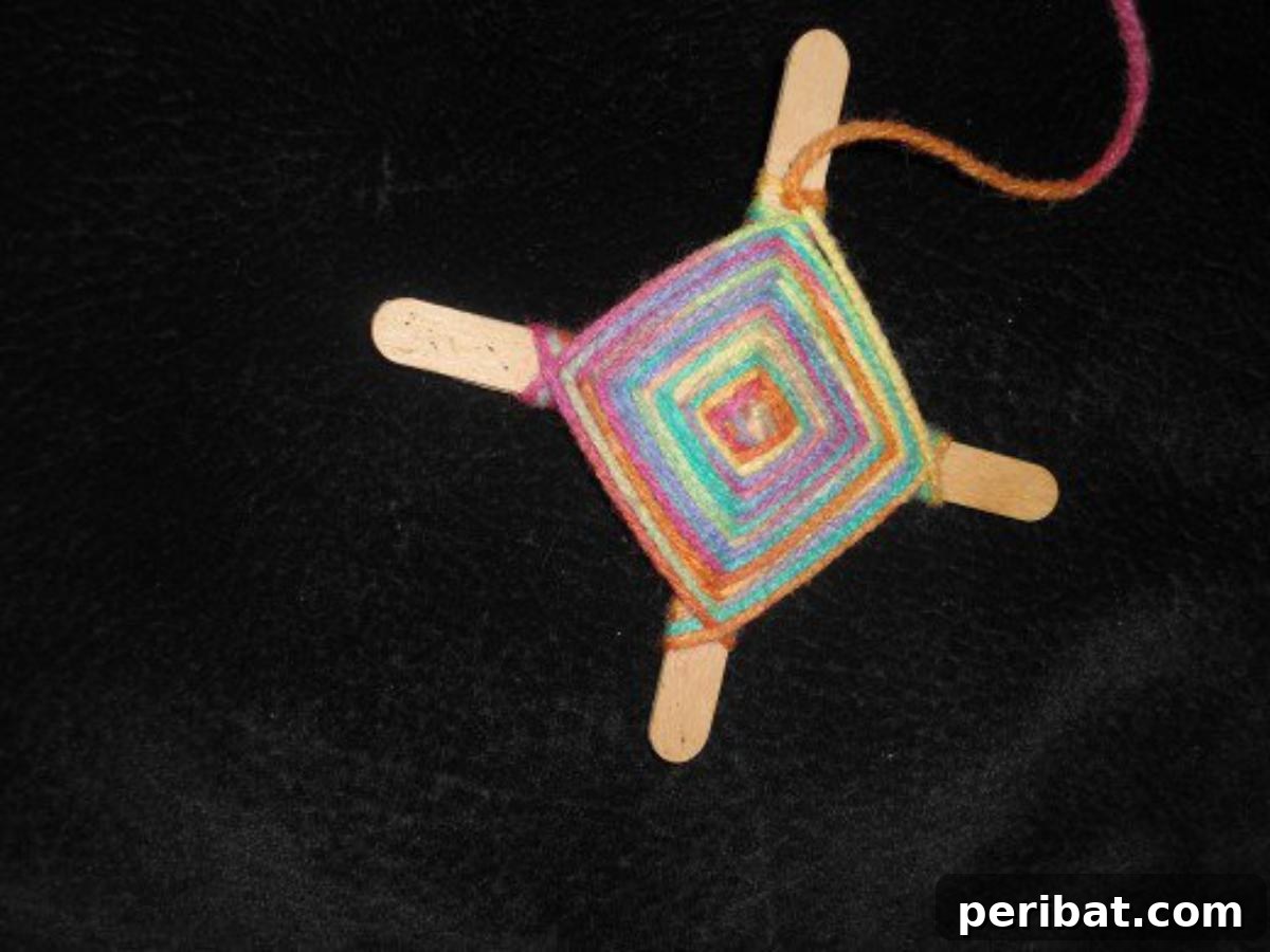 God’s Eyes Using Yarn and Popsicle Sticks, a culturally rich craft.