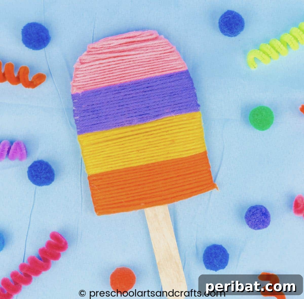 Yarn-Wrapped Popsicle Craft for preschoolers to develop fine motor skills.