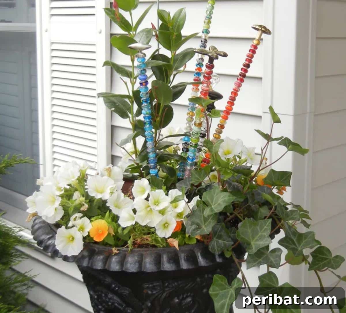 Luminous Garden Fairy Wands crafted from beads and cabinet pulls, sparkling in a garden setting.