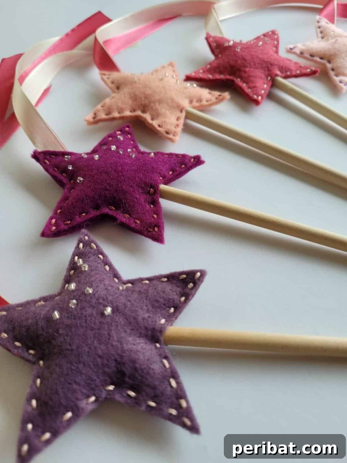 A charming DIY Felt Fairy Wand, handcrafted with soft felt and embellishments.
