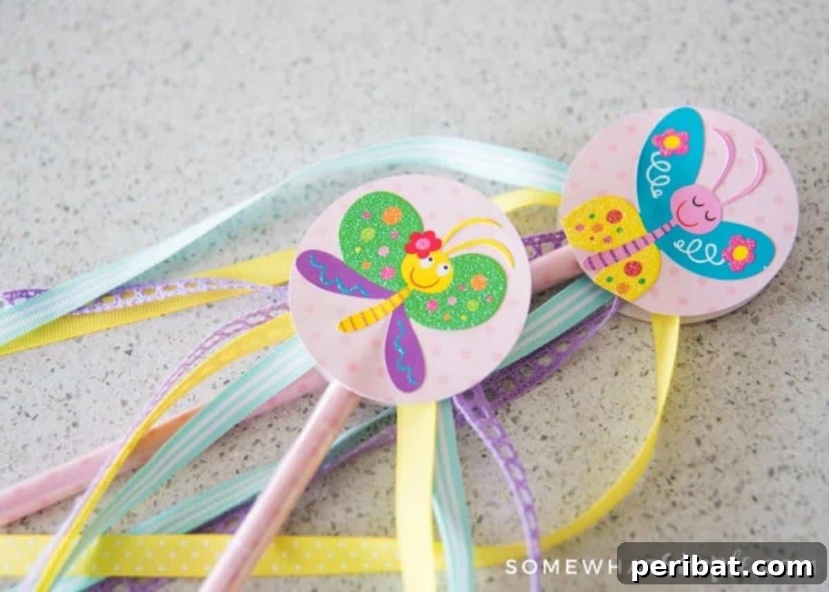 A creative Butterfly Fairy Wand made from a pencil and colorful ribbons.