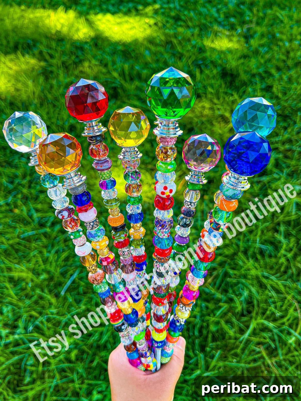 Fairy Garden Rainbow Catcher Stakes, sparkling with reflective crystals.