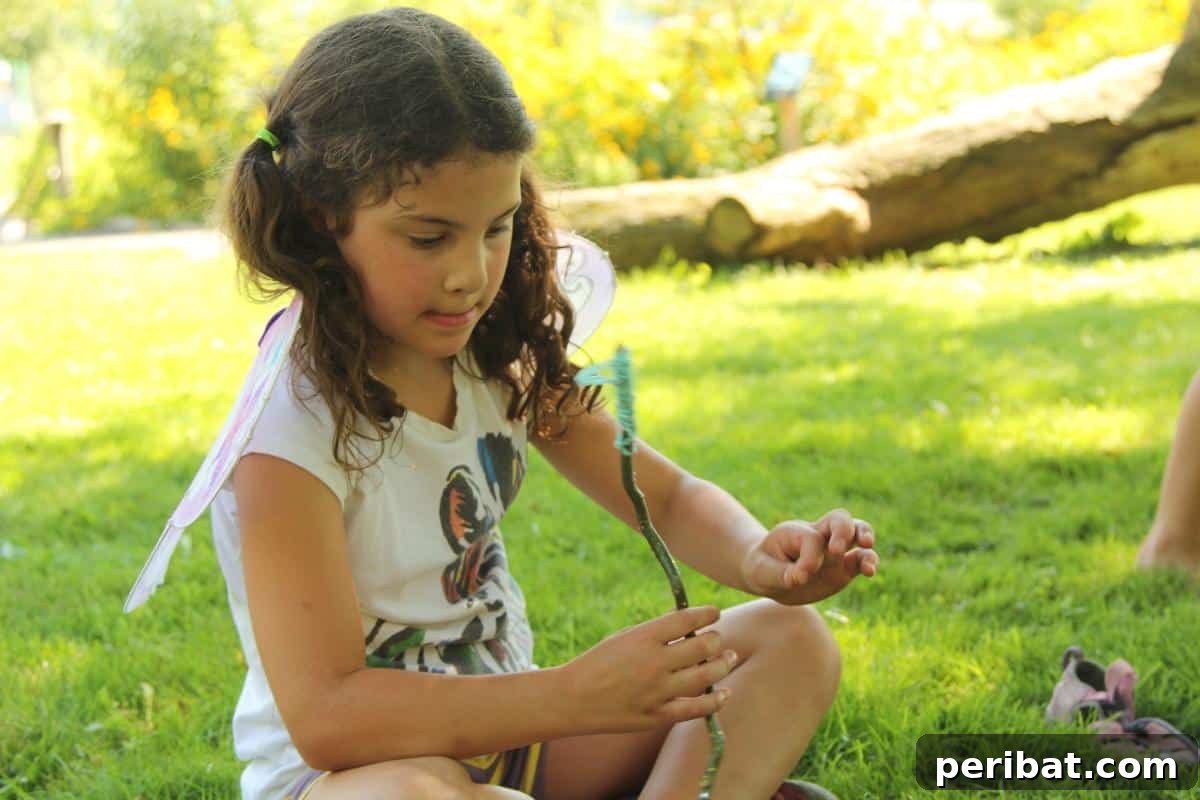 A young girl joyfully holding two vibrant classic fairy wands.