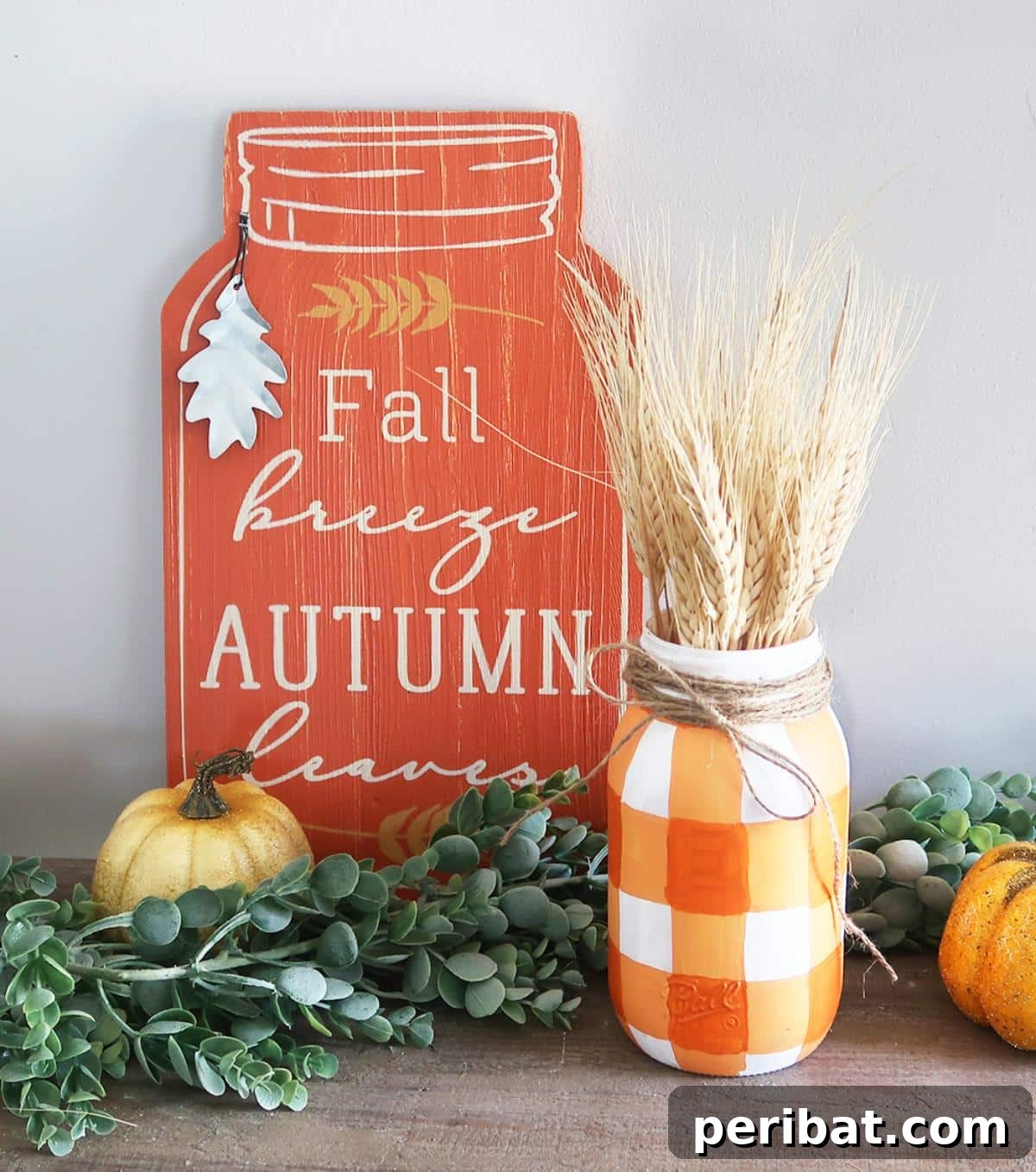 Stylish DIY painted buffalo check plaid mason jar, ideal for modern farmhouse fall decor.