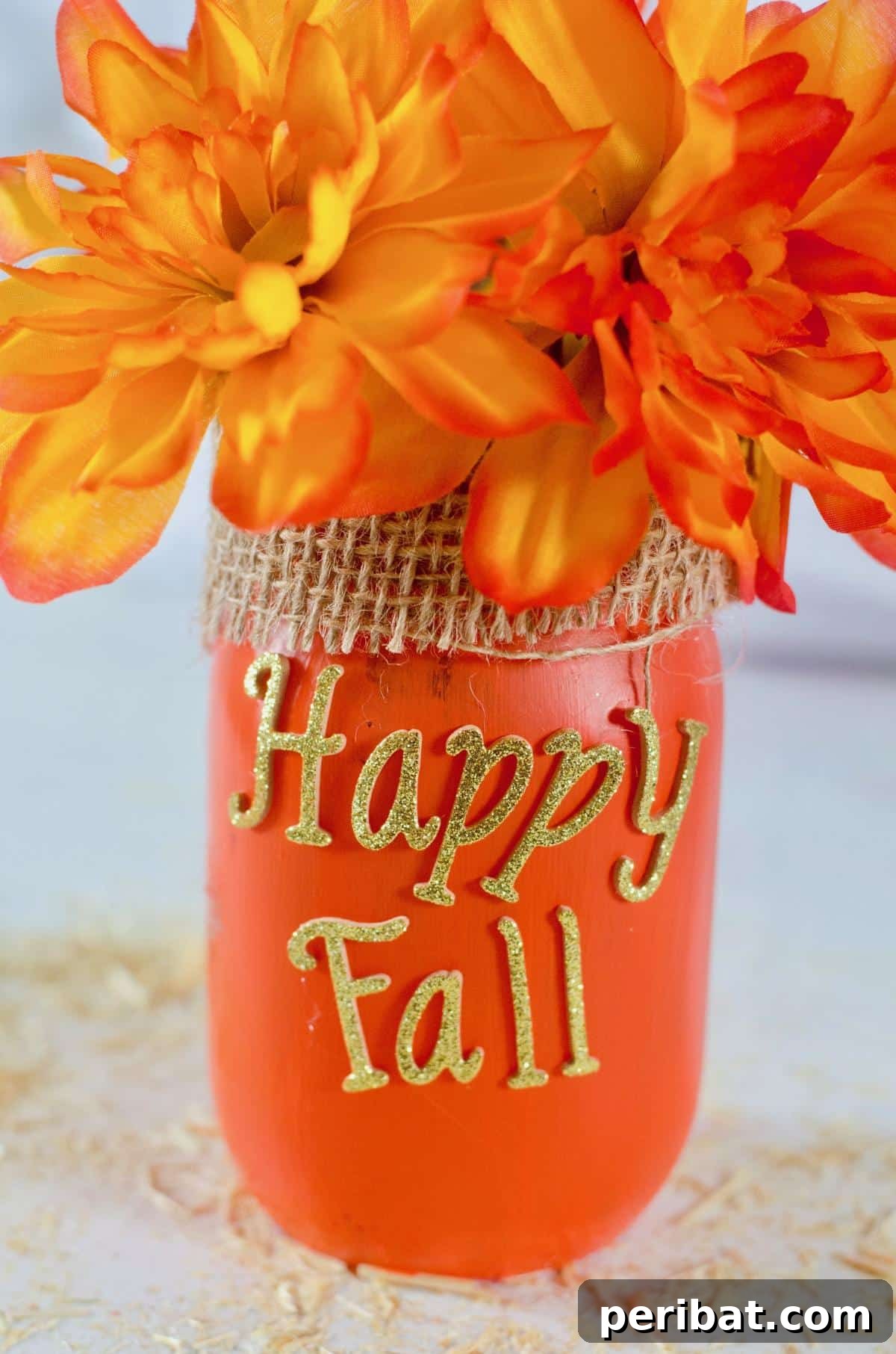 Cheery 'Happy Fall' mason jar, perfect for seasonal blooms or as a centerpiece.