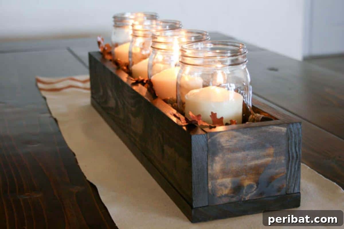 Elegant DIY fall centerpiece featuring mason jars in a stunning seasonal display.