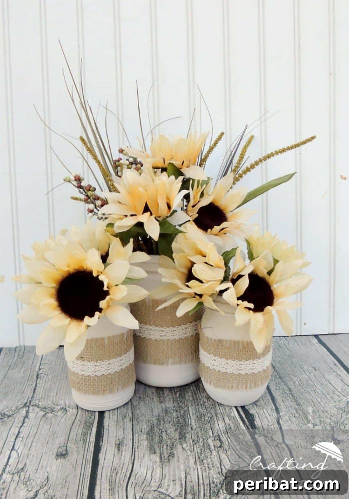 Budget-friendly fall jars decorated with vibrant dollar store flowers.