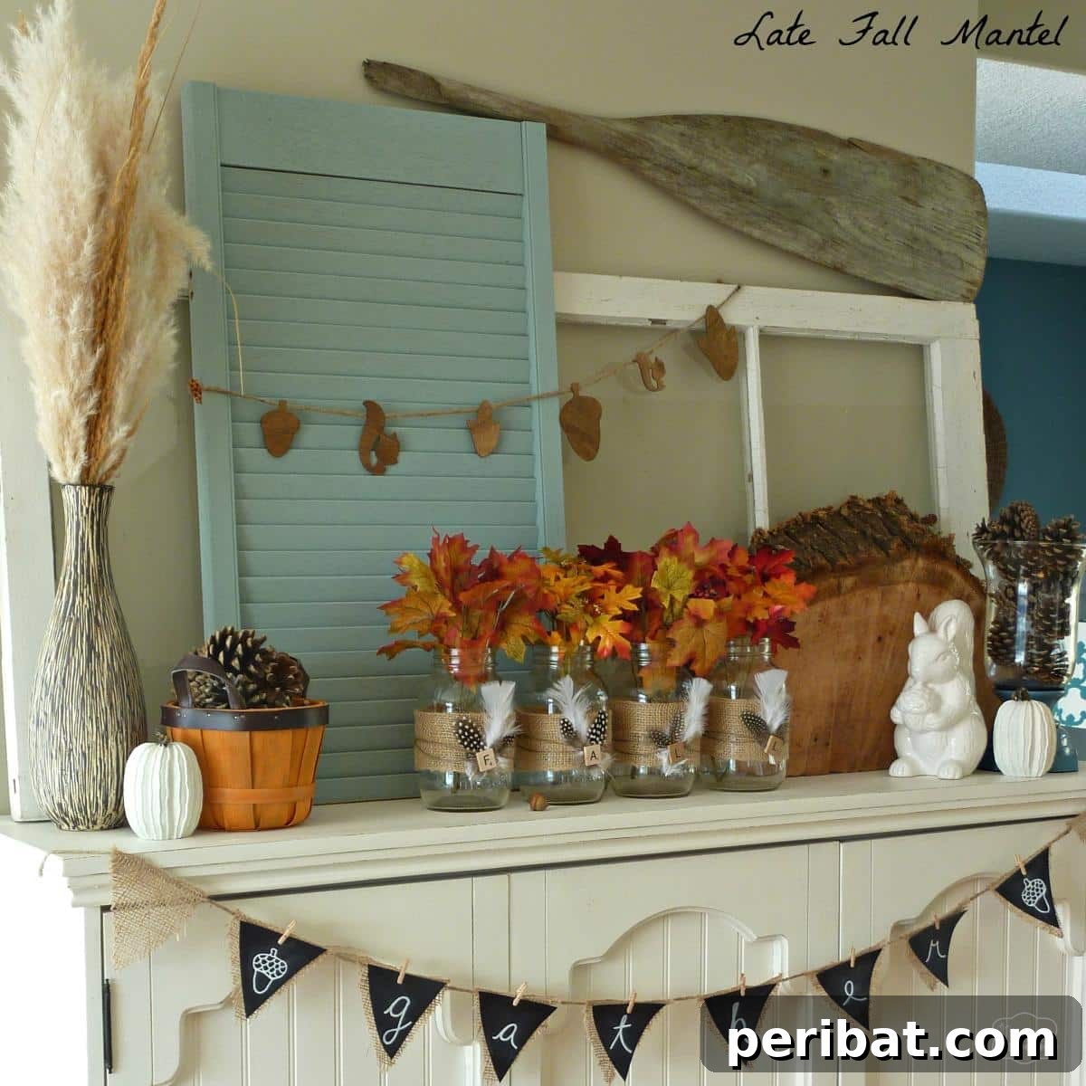Rustic late fall mantel decor with DIY burlap and feather wrapped mason jars.