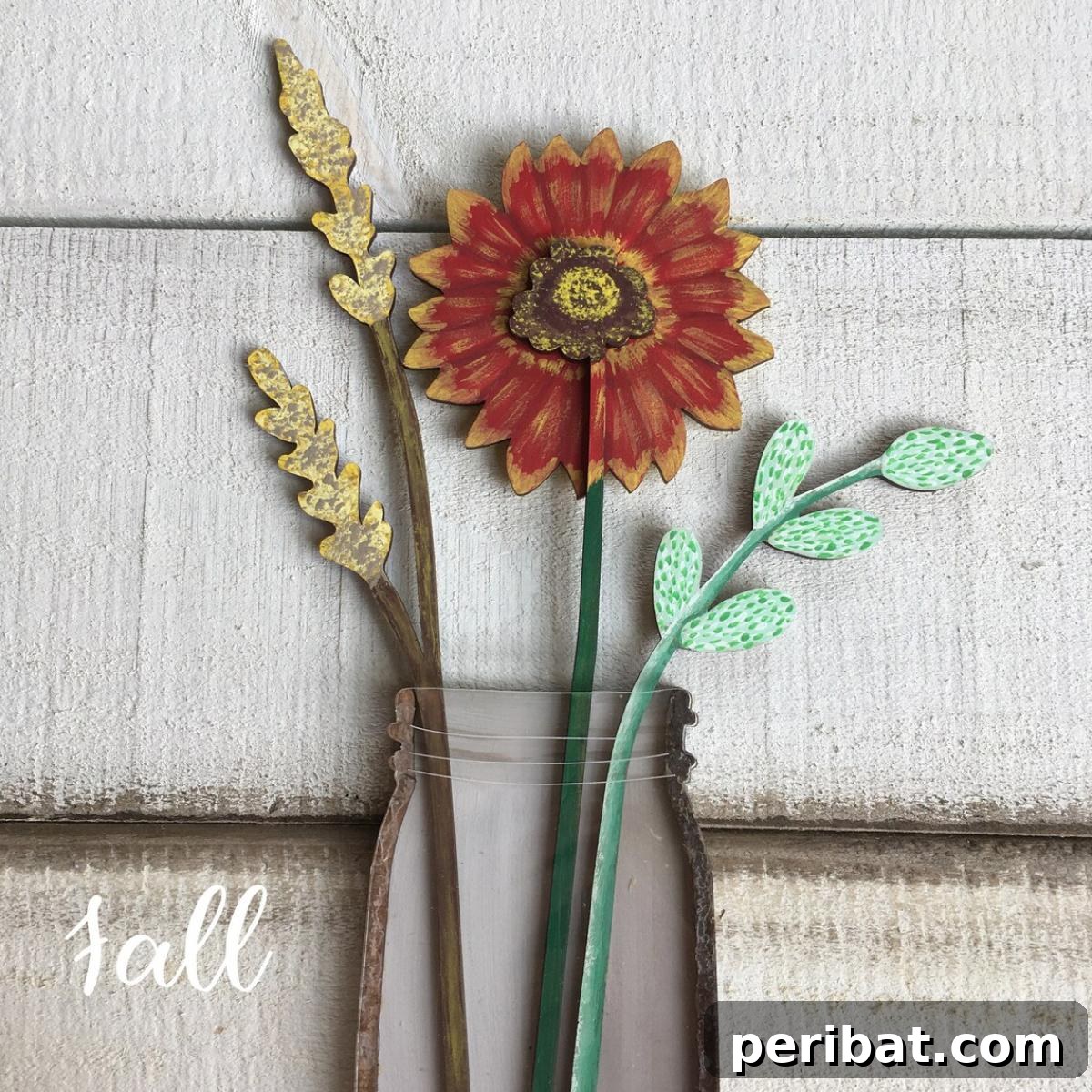 Beautiful fall mason jar flower vase craft, perfect for displaying autumn blossoms.