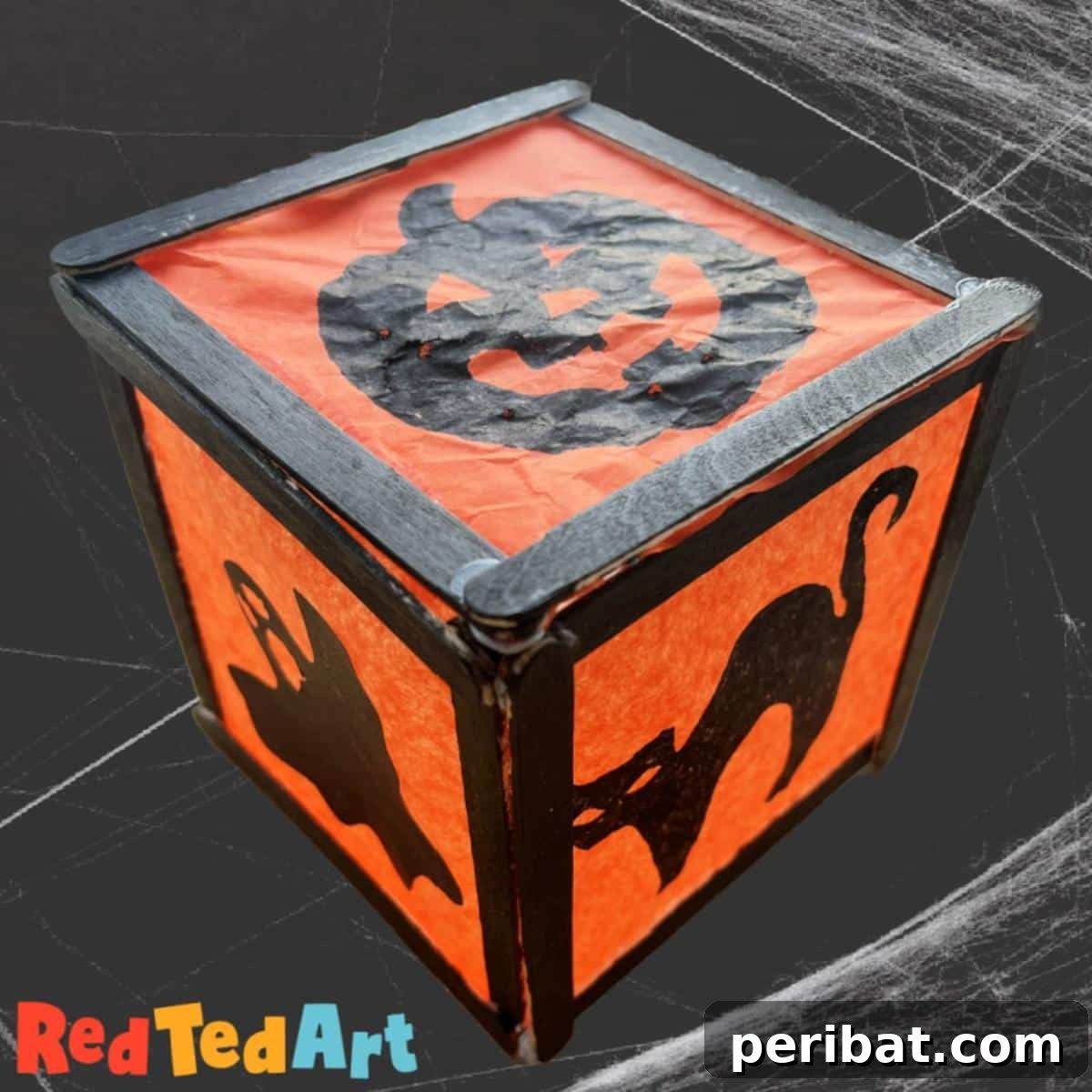 Spooktacular Popsicle Stick Halloween Projects 14 An easy Halloween lantern craft made from popsicle sticks, painted with spooky designs and glowing from within.