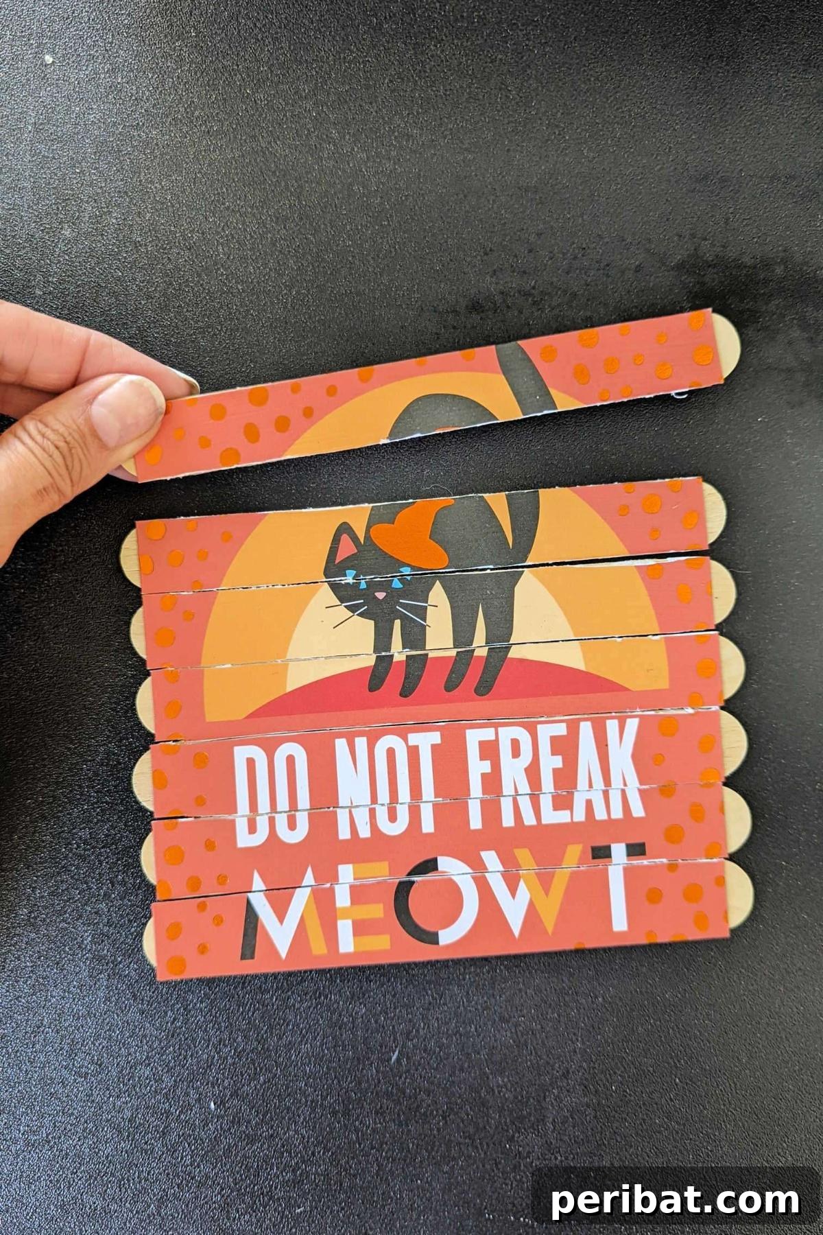 Spooktacular Popsicle Stick Halloween Projects 24 Halloween-themed puzzles made from popsicle sticks, featuring colorful images of monsters and spooky characters.