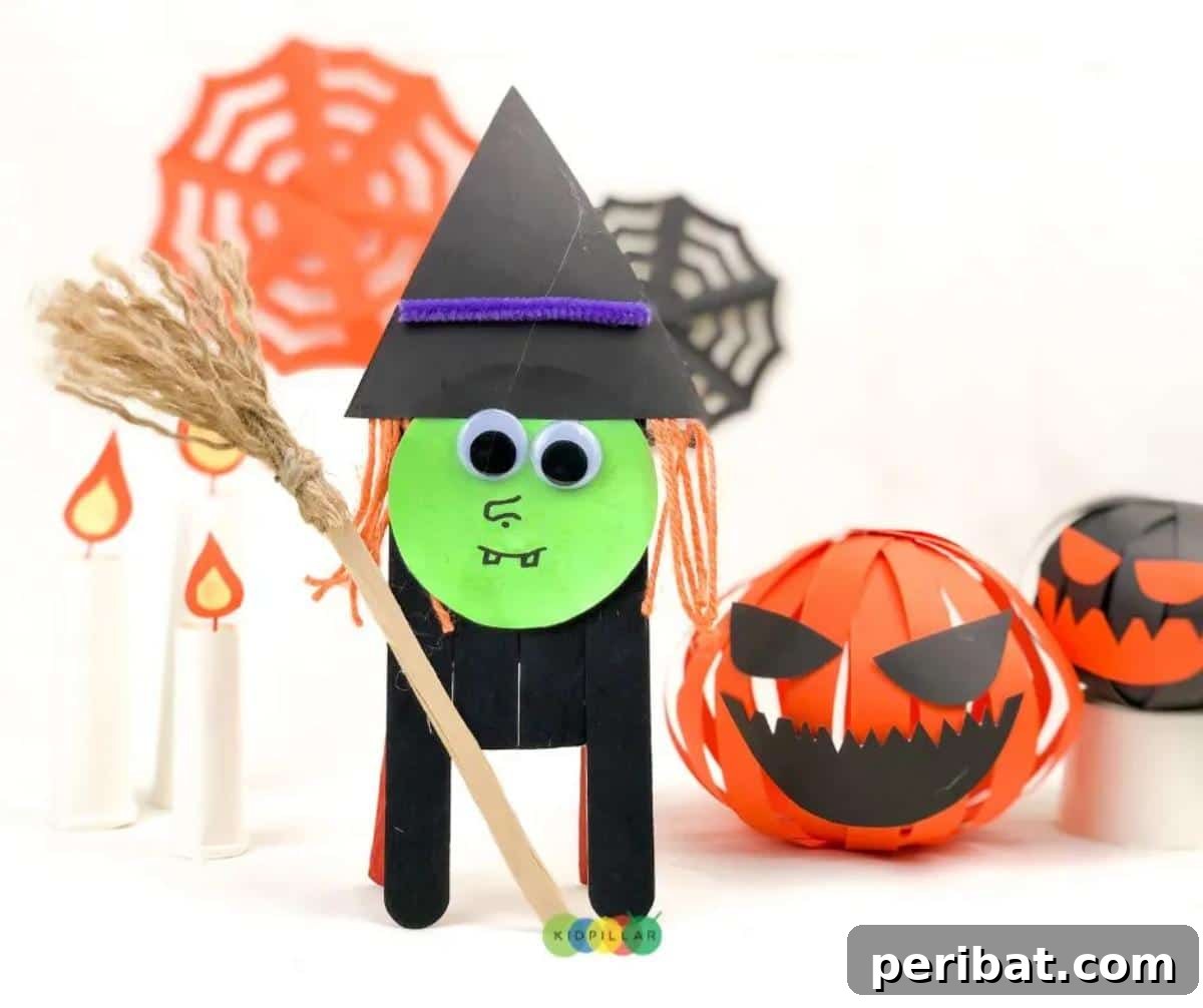 Spooktacular Popsicle Stick Halloween Projects 5 A smiling witch figure crafted from popsicle sticks, featuring a black hat, broomstick, and purple details.