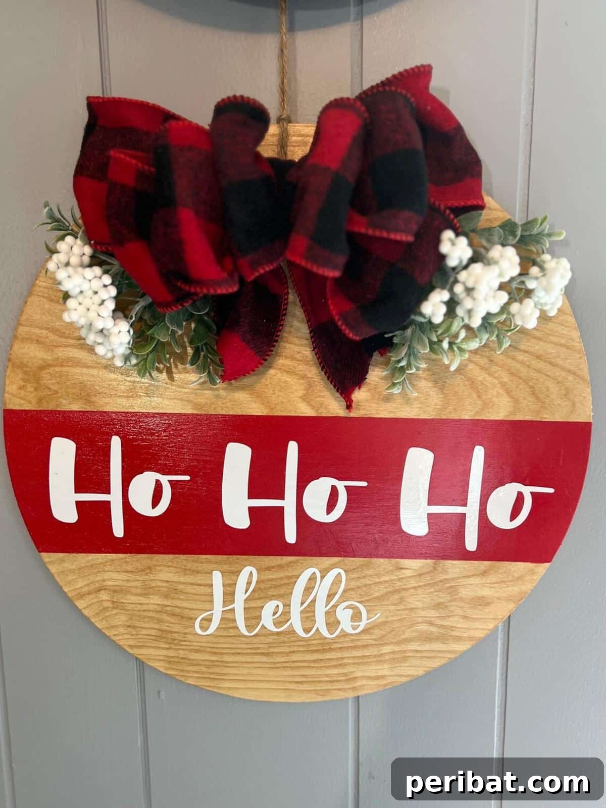 Deck the Gourds: 25 Christmas Pumpkin Painting Ideas 23 Round Wood Door with Festive Christmas Pumpkin