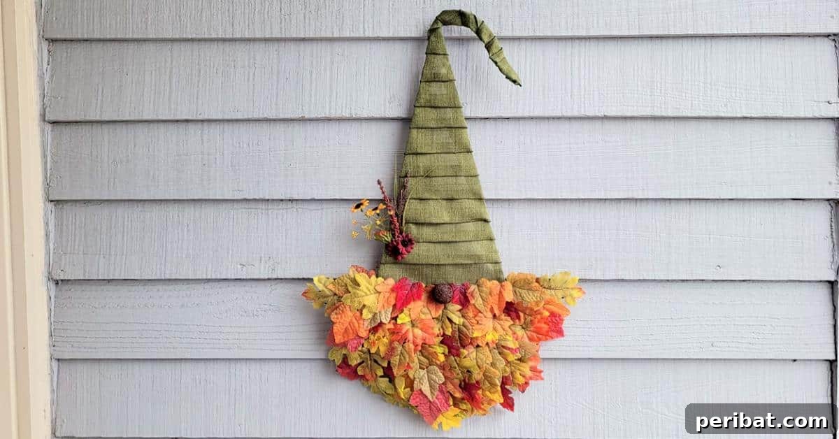 Whimsical Fall Gnome Wreath Inspirations 18 Unbe-Leaf-Able Gnome Wreath for Fall, a pun-inspired autumn decoration.