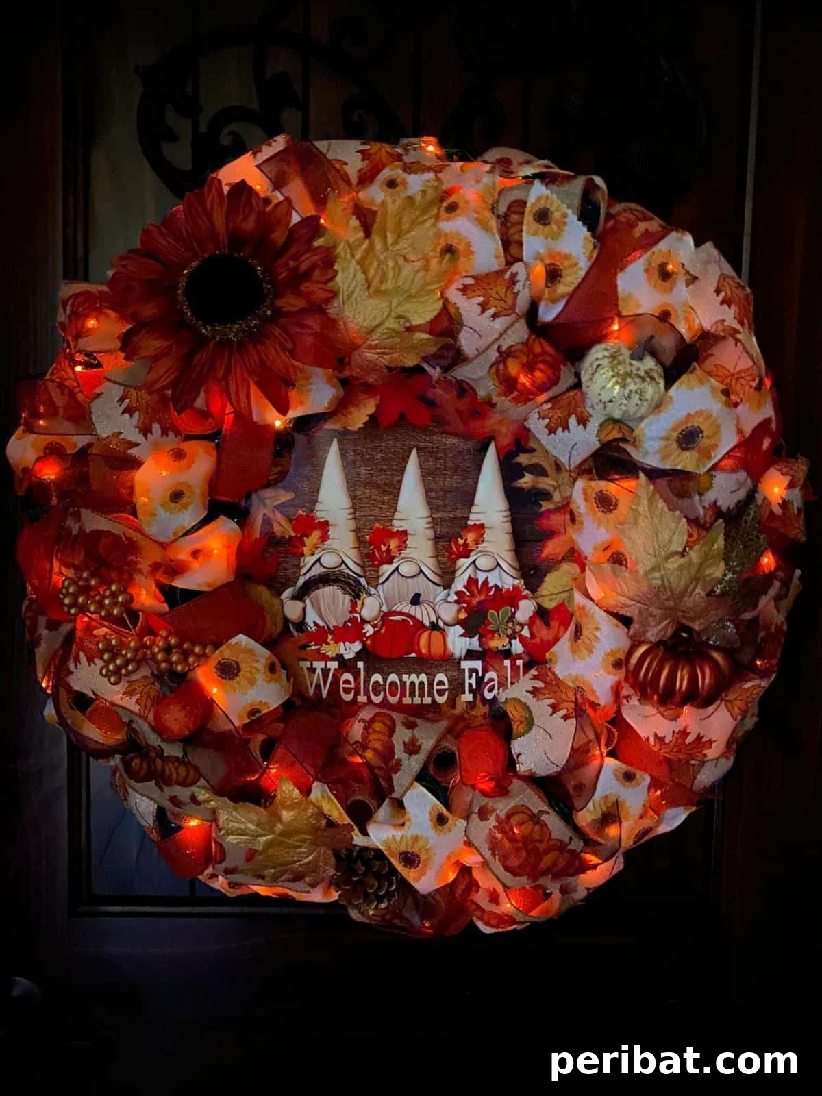 Whimsical Fall Gnome Wreath Inspirations 23 Gnome Fall Wreath with charming orange fairy lights for an evening glow.