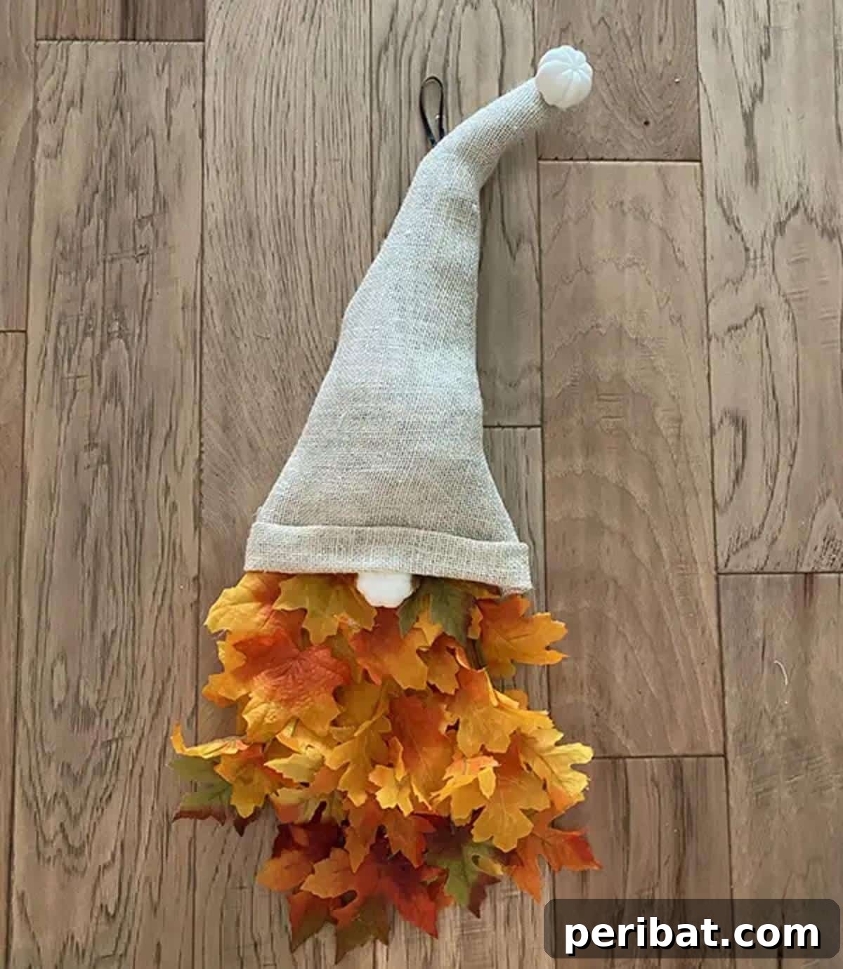 Whimsical Fall Gnome Wreath Inspirations 4 DIY Fall Gnome Wreath, combining rustic burlap with colorful autumn leaves.