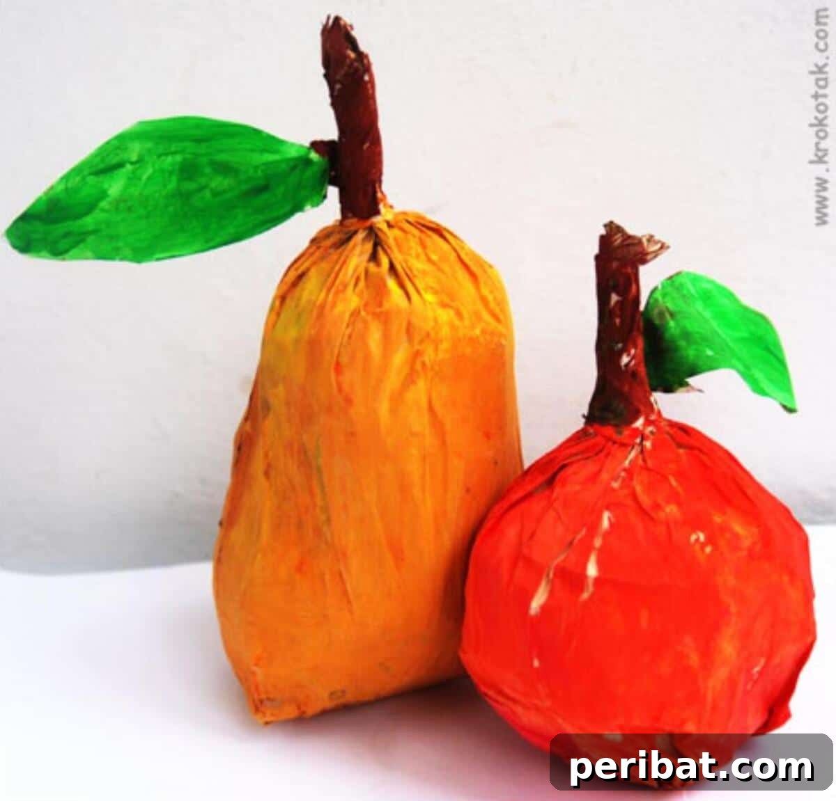 26 Autumnal Paper Bag Crafting Gems 21 Realistic-looking paper bag fruits like apples and pears, crafted for decorative displays.