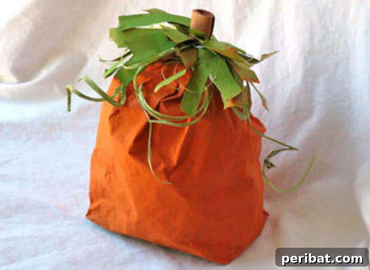26 Autumnal Paper Bag Crafting Gems 7 A cheerful paper bag pumpkin, a versatile craft for fall decorations or treat bags.