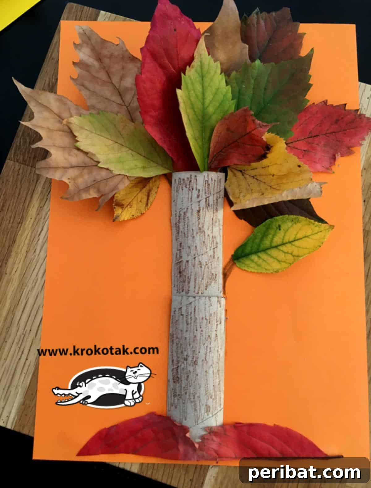 Fall Tree Project Using A Toilet Paper Roll, with colorful paper leaves.