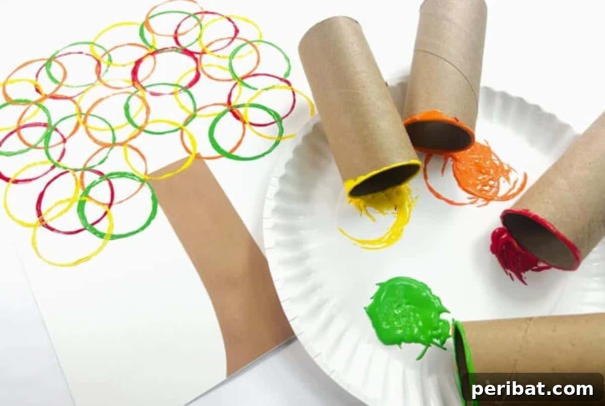 DIY Paper Towel Tube Painting technique, used to stamp fall leaves.
