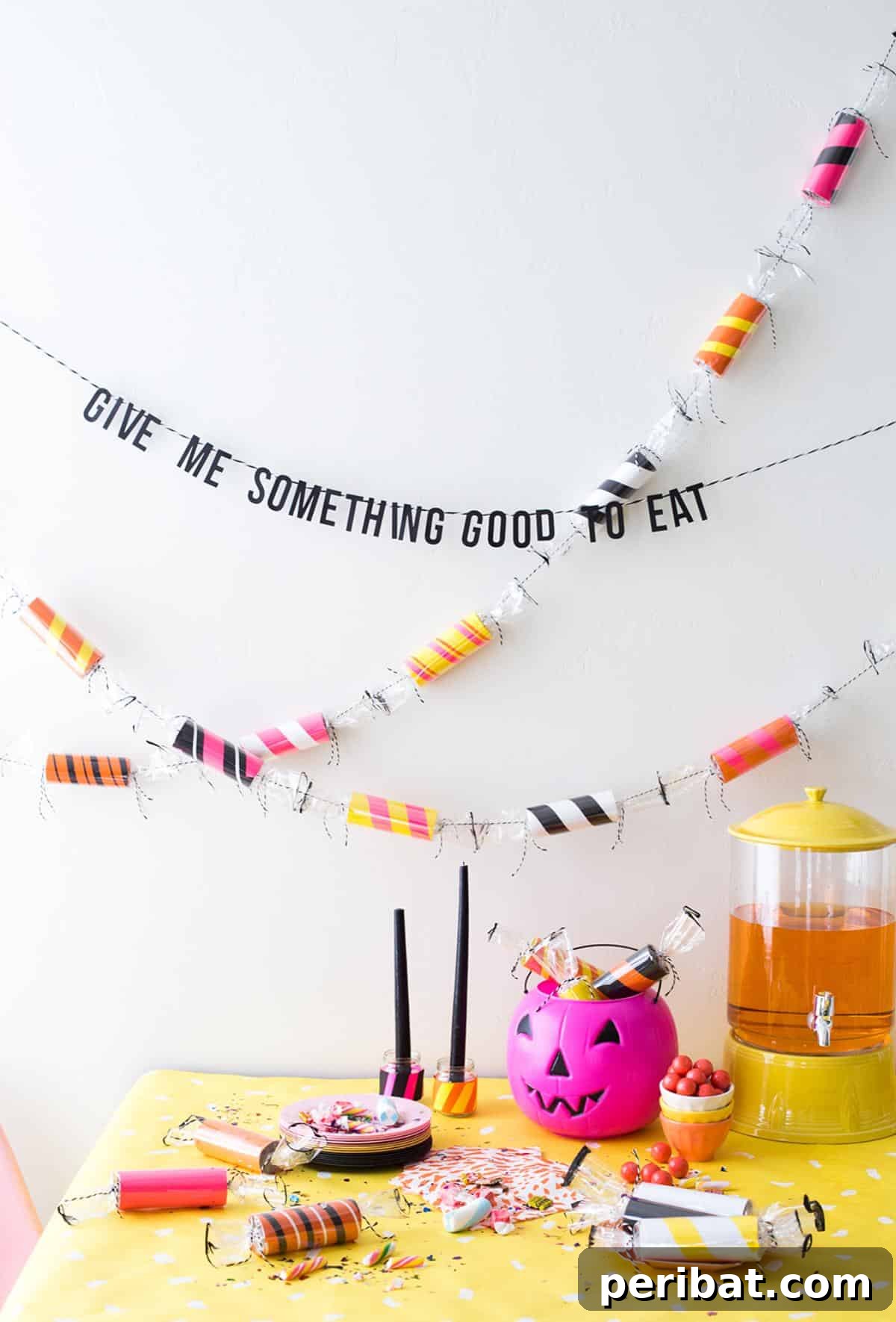 DIY Toilet Paper Roll Candy Garland, shaped like colorful wrapped candies.