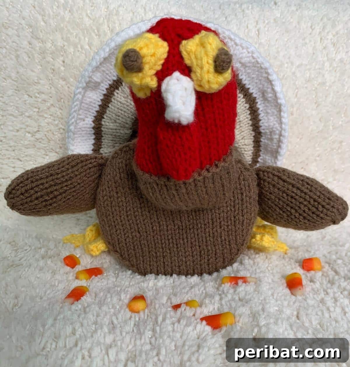 Knit Toilet Paper Roll Cover shaped like a turkey.