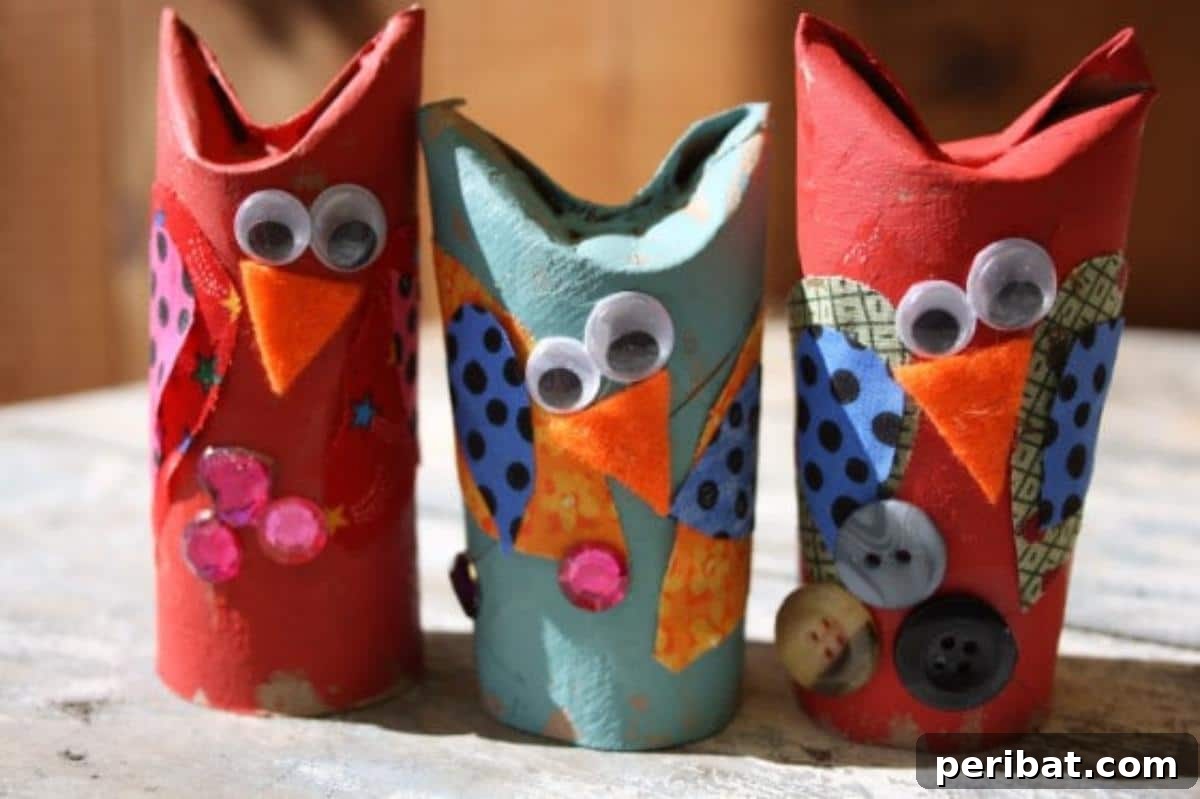 Adorable Toilet Roll Owl Craft for Kids with big eyes and colorful wings.