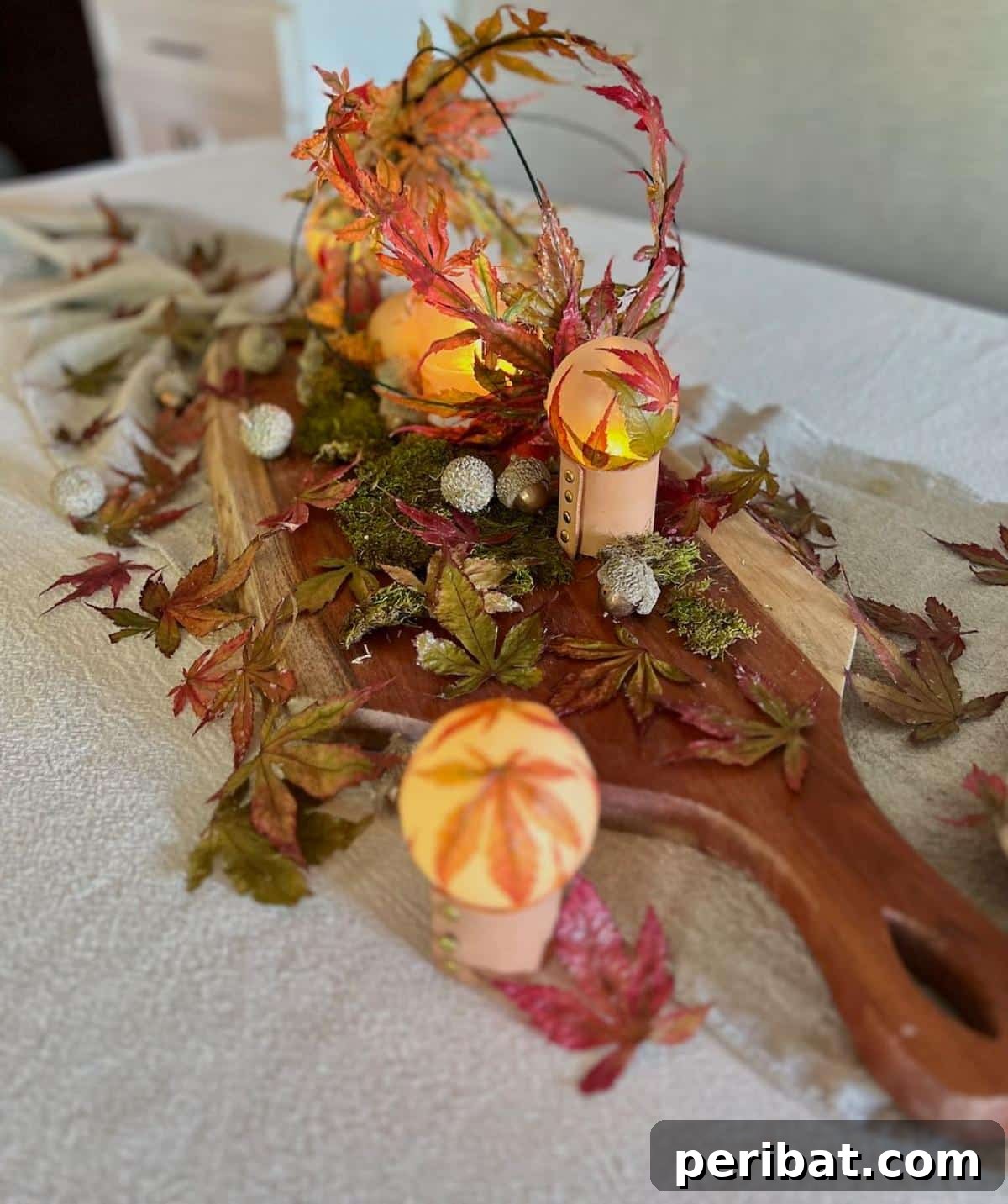 Colorful fall leaves preserved with Mod Podge, used to create charming and durable decorative accents for the home, like a unique bowl or coaster.