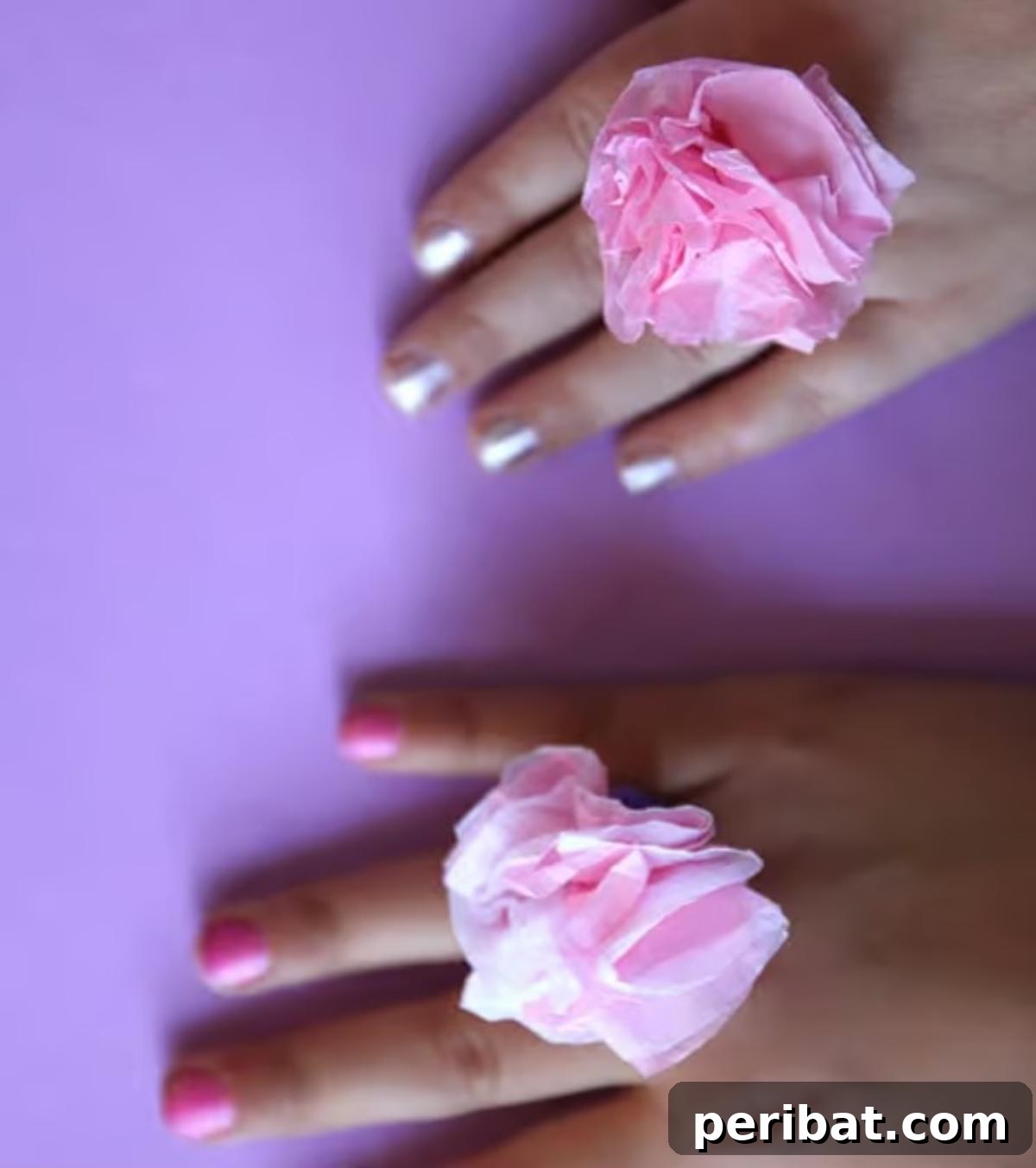 Vibrant Tissue Paper Crafts: 40 DIY Ideas 15 Easy Tissue Paper Flower Rings for Kids. Small, colorful tissue paper flowers crafted into playful rings, perfect for children's imagination and pretend play.