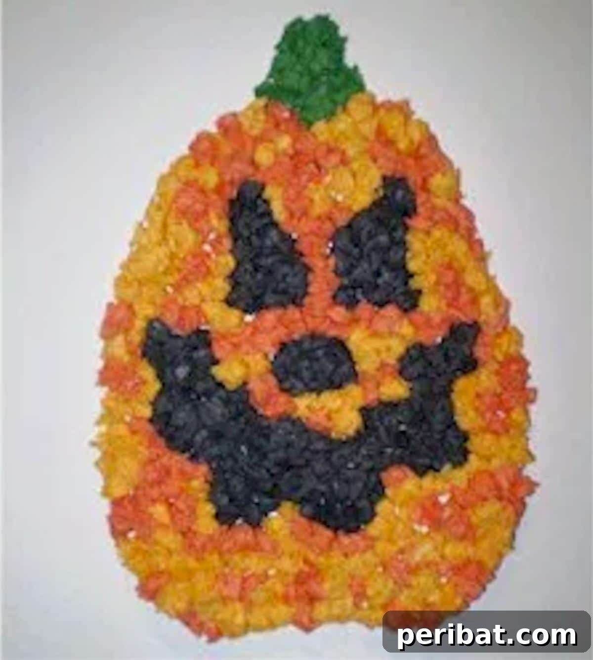 Vibrant Tissue Paper Crafts: 40 DIY Ideas 16 Tissue Paper Jack-O-Lantern. A charming, glowing jack-o'-lantern decorated with colorful tissue paper, emitting a warm, festive light, ideal for Halloween.