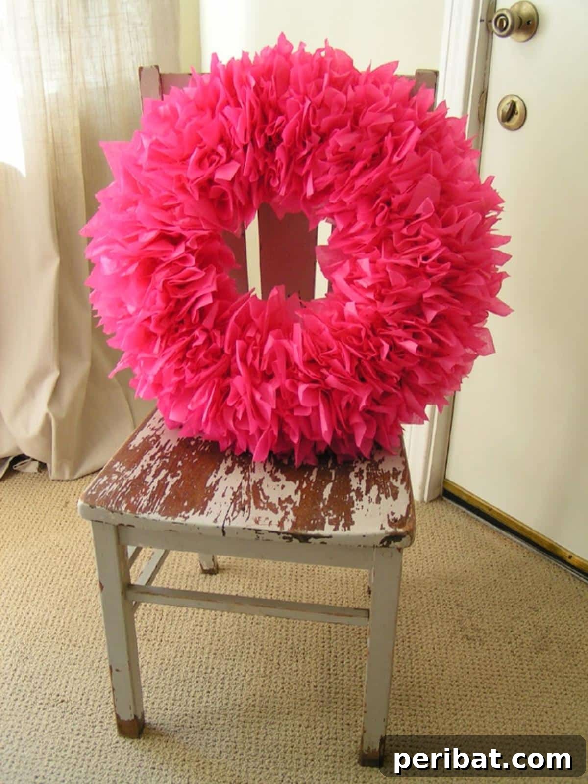 Vibrant Tissue Paper Crafts: 40 DIY Ideas 24 Tissue Paper Wreath. A fluffy and vibrant tissue paper wreath, showcasing multiple layers of colored tissue paper in a circular design, perfect for seasonal decor.