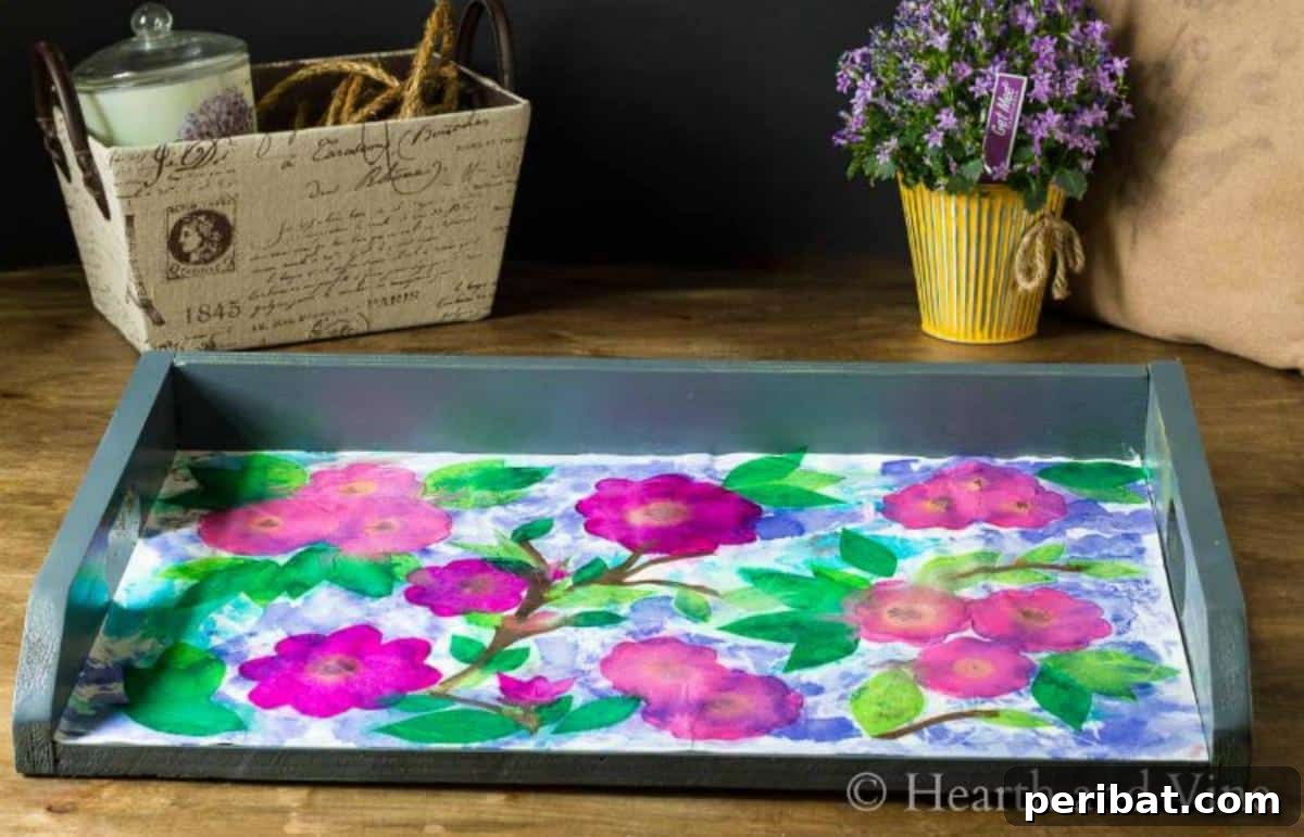 Vibrant Tissue Paper Crafts: 40 DIY Ideas 32 Bleeding Tissue Paper Art For Decorating a Serving Tray. A unique serving tray decorated with vibrant, bleeding tissue paper art, creating an abstract and colorful pattern, perfect for home decor.
