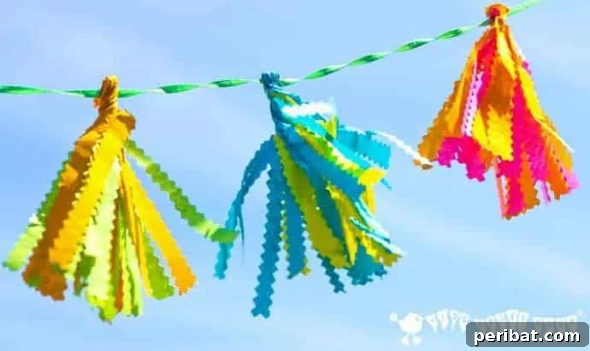 Vibrant Tissue Paper Crafts: 40 DIY Ideas 35 The Cutest Mini Tissue Paper Tassel Garlands. A delicate garland featuring an array of miniature tissue paper tassels in soft pastel colors, perfect for intimate celebrations or charming decor.