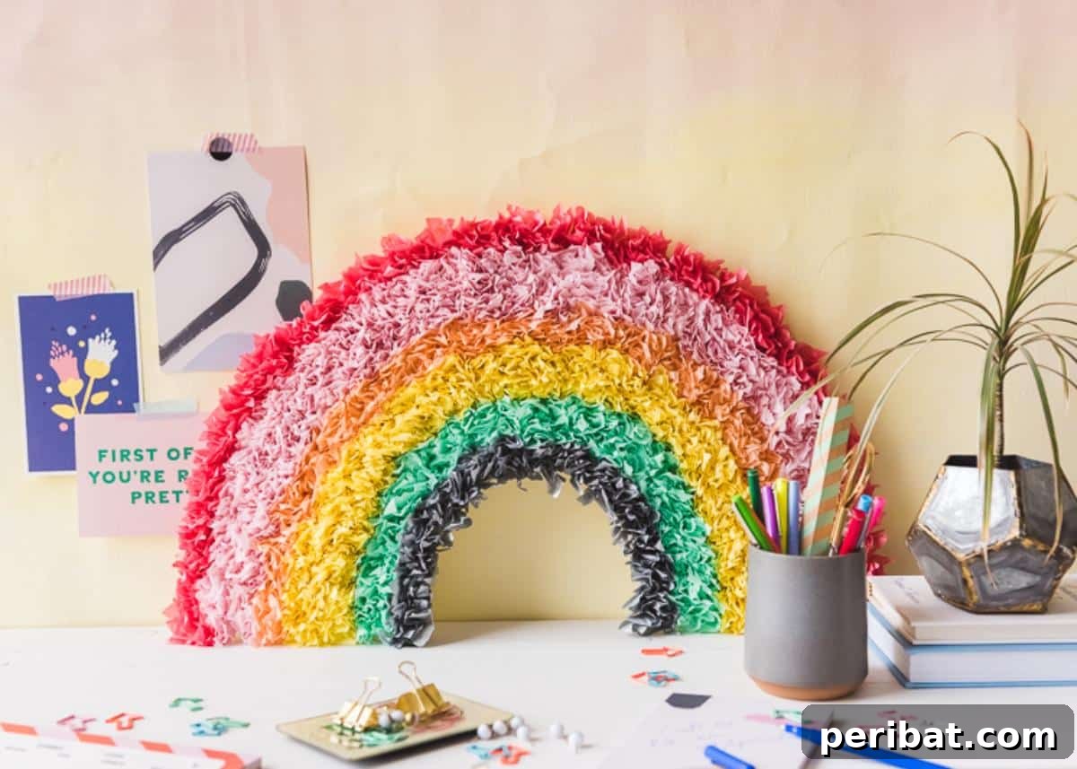 Vibrant Tissue Paper Crafts: 40 DIY Ideas 36 DIY Tissue Paper Rainbow. A vibrant and cheerful DIY rainbow crafted from layers of colorful tissue paper, perfect for adding joy and color to a child's room or playroom.