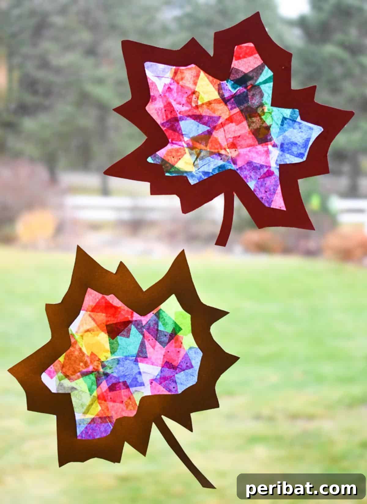 Vibrant Tissue Paper Crafts: 40 DIY Ideas 8 Tissue Paper Leaf Suncatchers. Vibrant, leaf-shaped suncatchers crafted from tissue paper, showcasing a beautiful mosaic of autumn colors when illuminated by sunlight.