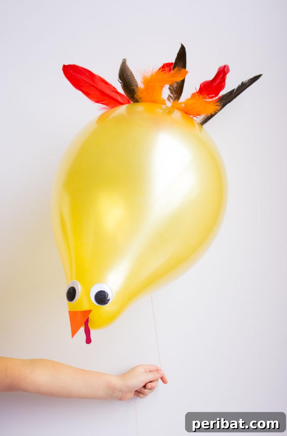 Helium balloons decorated as festive Thanksgiving turkeys.