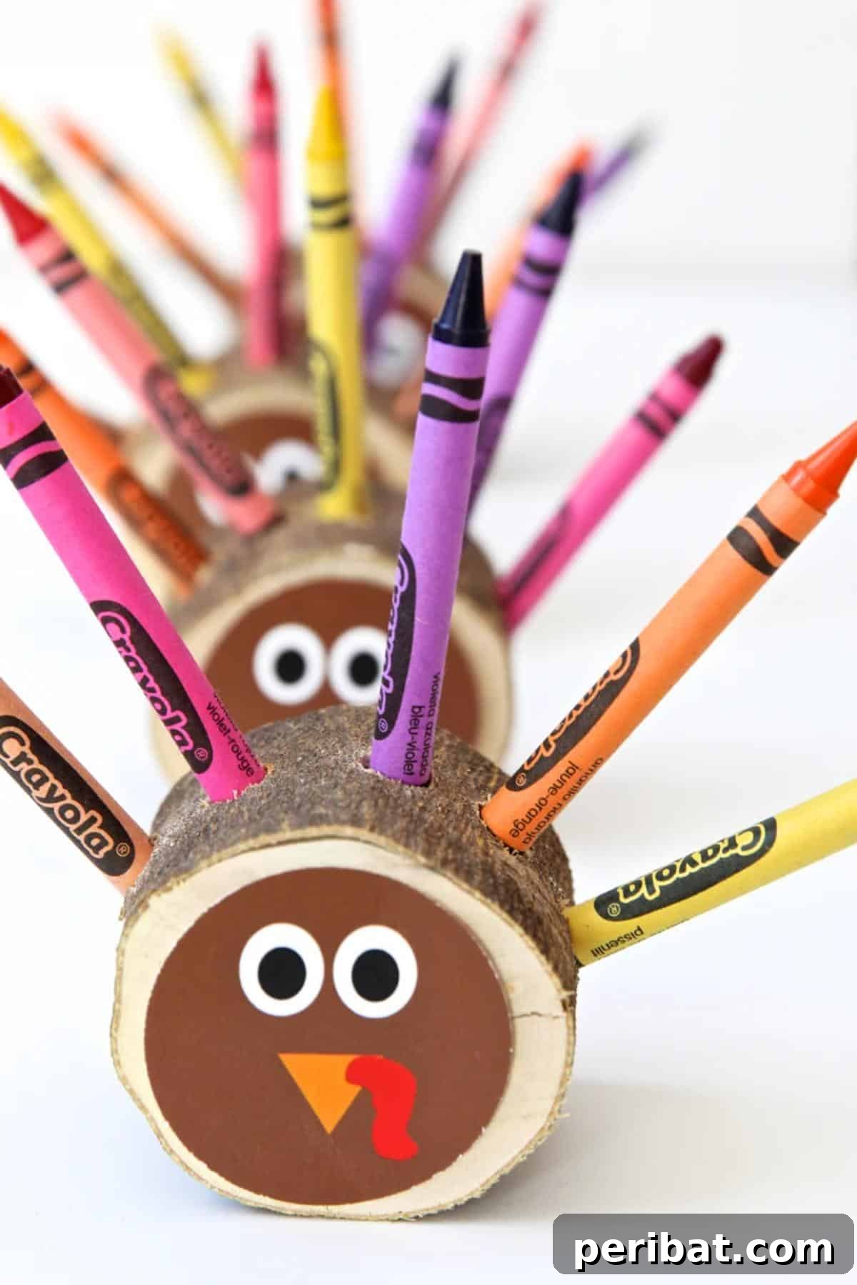 Crayon holders crafted in the shape of turkeys, ideal for a Thanksgiving kids' table.