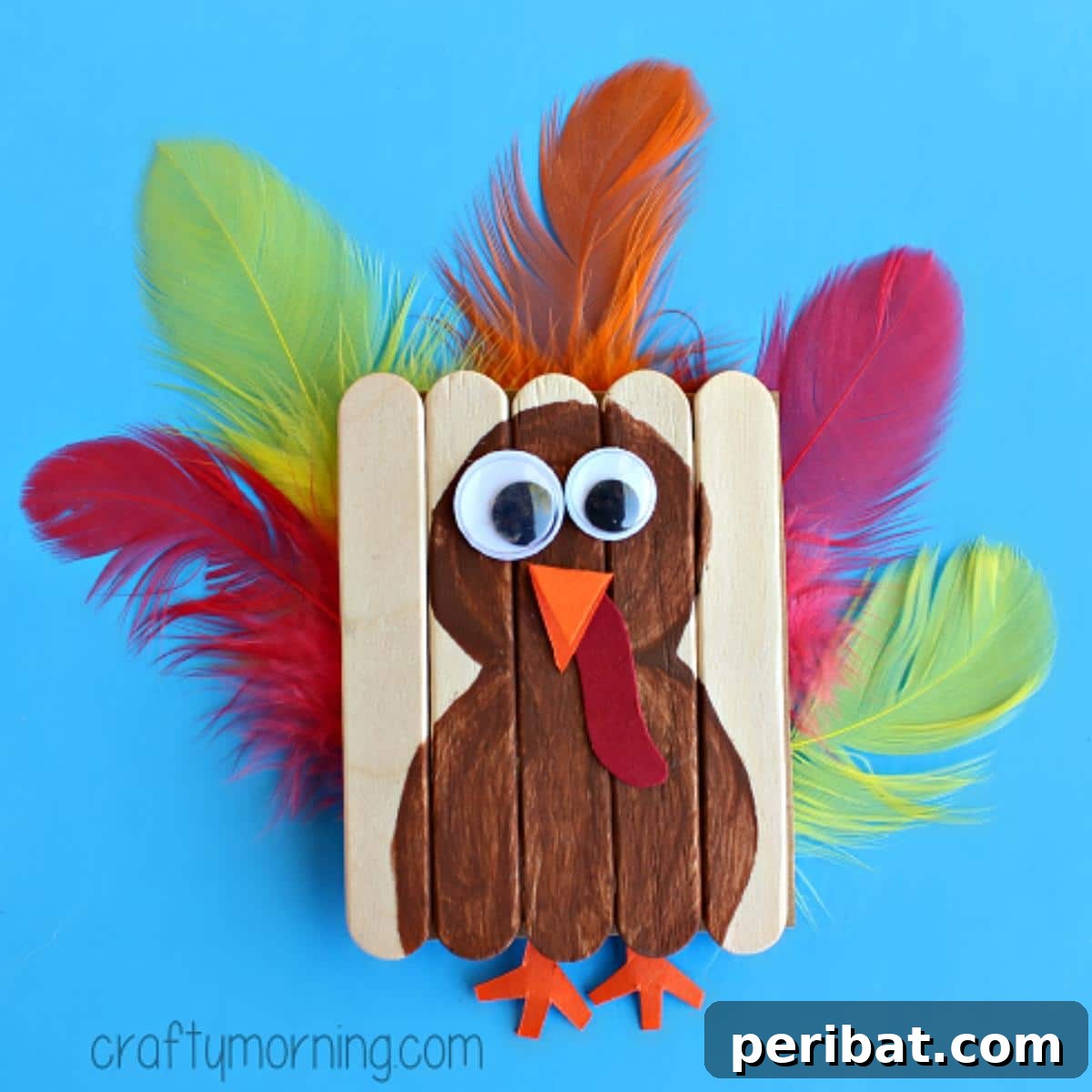 A tiny and cute turkey decoration made from mini popsicle sticks.