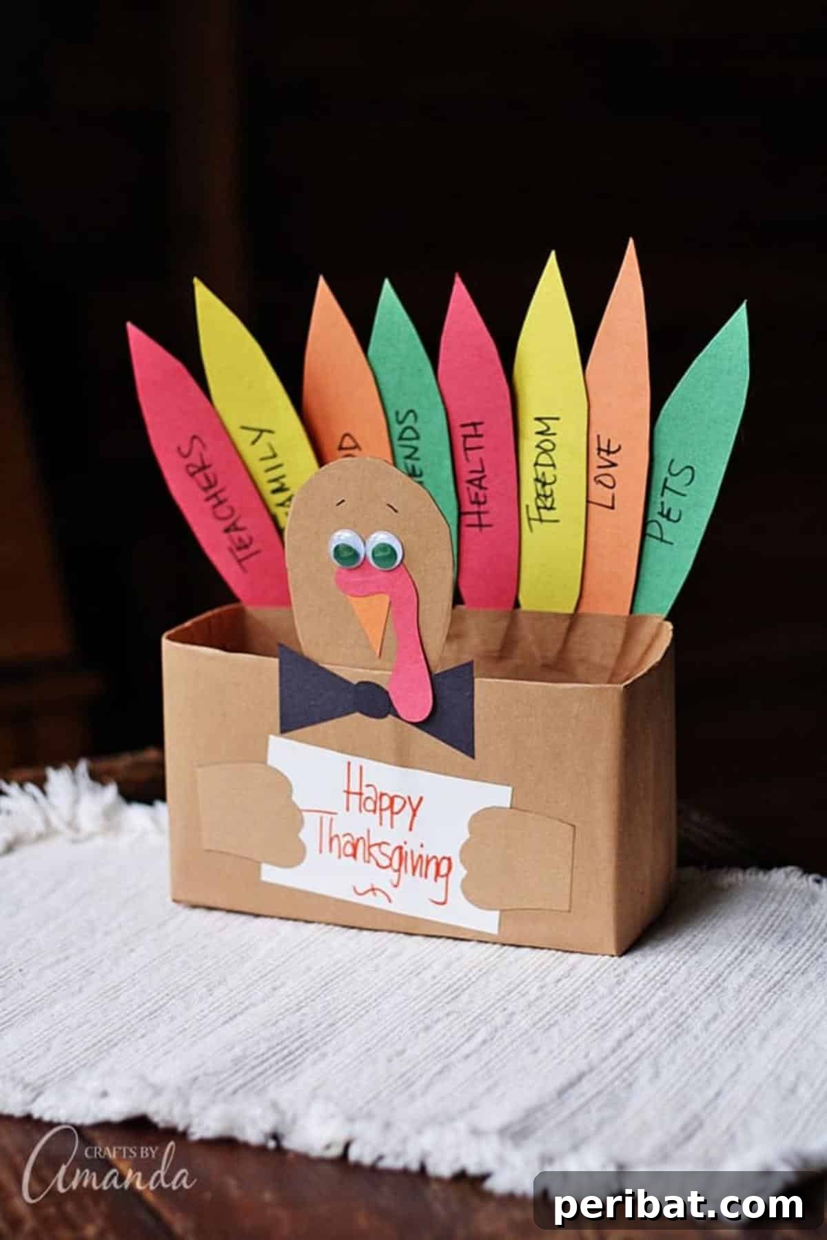 A cereal box turkey decorated with thankful messages.