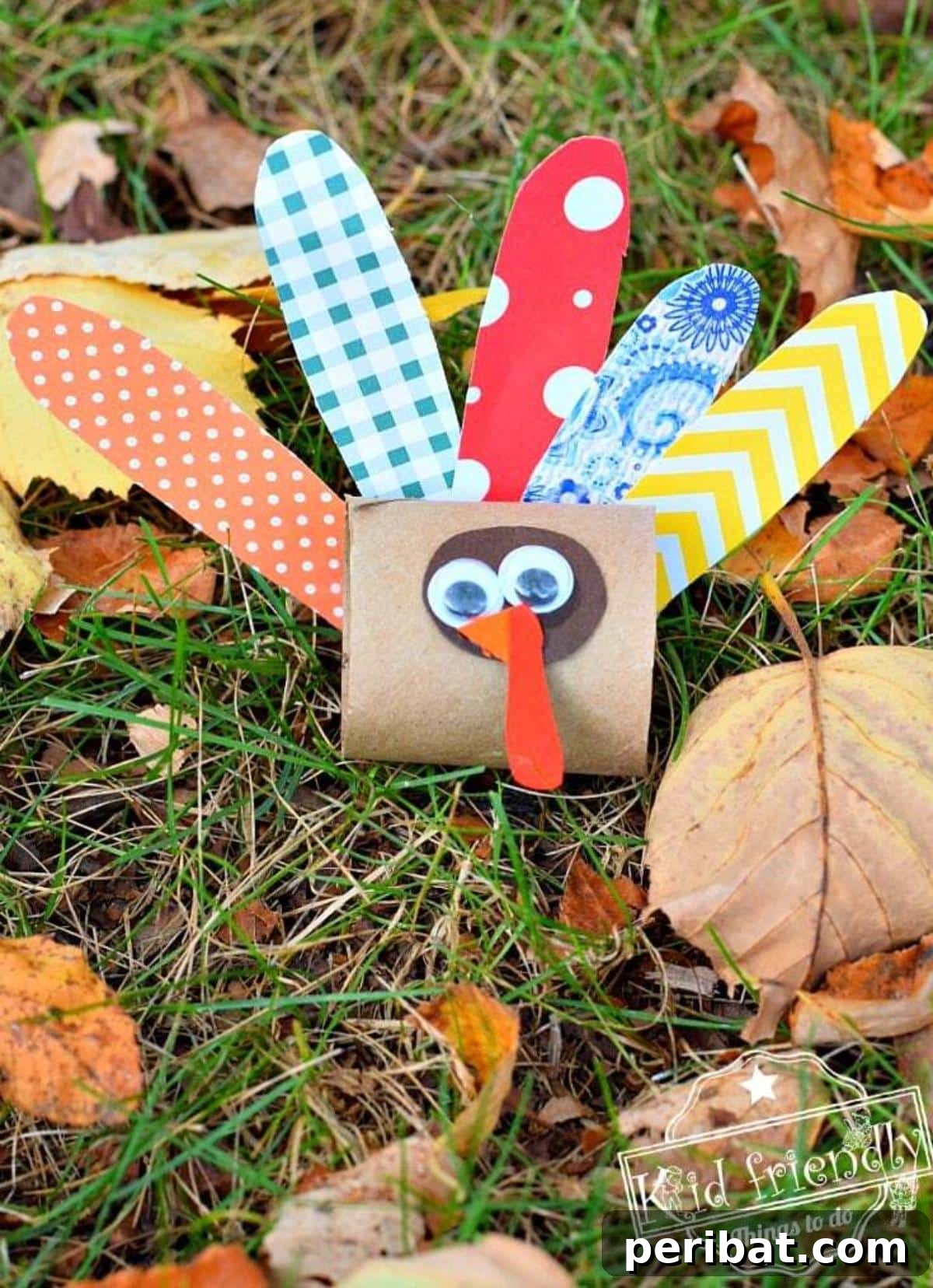 A cute little turkey craft made from a toilet paper tube and colorful scraps.