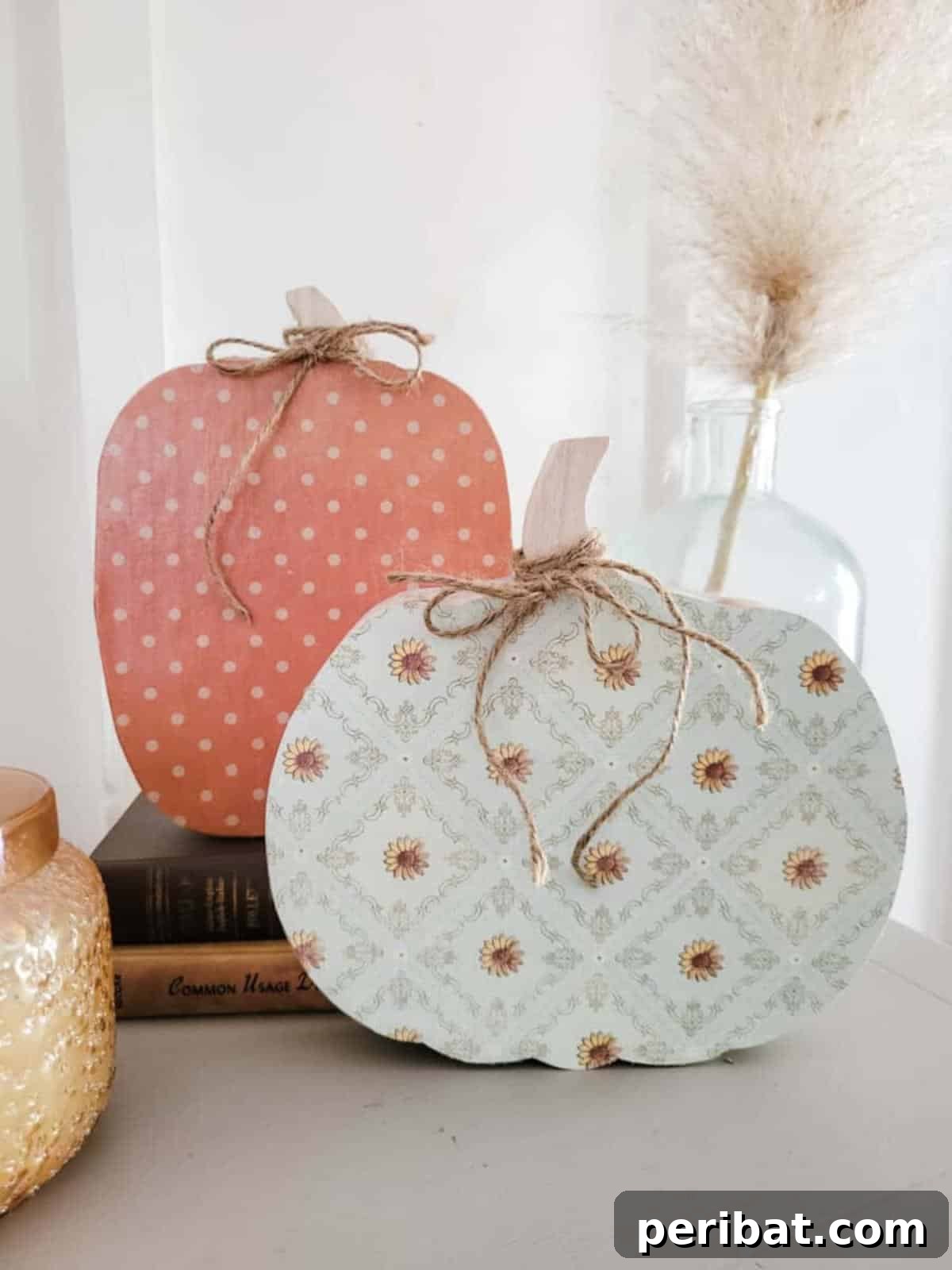Simple Wooden Pumpkin Crafts for Autumn Decor 11 Delightful and easy wooden pumpkin craft featuring scrapbook paper.
