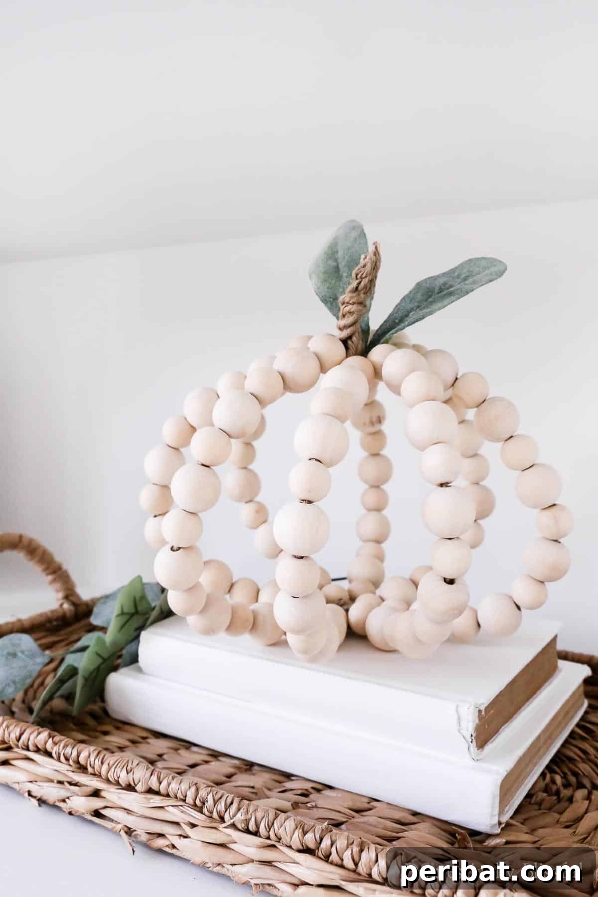 Simple Wooden Pumpkin Crafts for Autumn Decor 20 Stylish DIY wood bead pumpkin for modern fall decor.